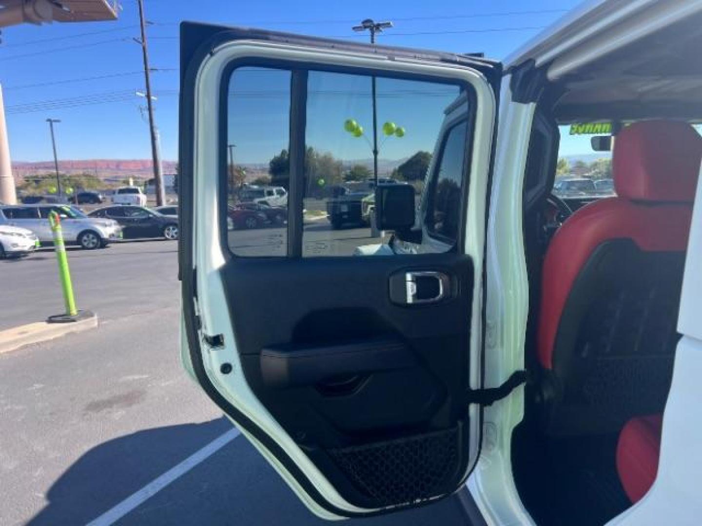 2021 Bright White Clearcoat /Red Jeep Gladiator Rubicon 4X4 (1C6JJTBG1ML) with an 3.6L V-6 DOHC engine, AUTOMATIC transmission, located at 1865 East Red Hills Pkwy, St. George, 84770, (435) 628-0023, 37.120850, -113.543640 - Classy red and white Gladiator rubicon with lift and tires. Great condition and drives straight. Specs: GVWR: 6,250 lbs w/Max Tow Package LED LIGHTING GROUP - AD6 Includes Daytime Running Lamps LED Accents LED Park Turn Lamps Front LED Fog Lamps LED Premium Reflector Headlamps LED Taillamps SA - Photo#20