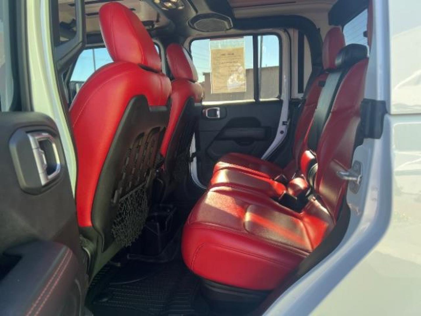 2021 Bright White Clearcoat /Red Jeep Gladiator Rubicon 4X4 (1C6JJTBG1ML) with an 3.6L V-6 DOHC engine, AUTOMATIC transmission, located at 1865 East Red Hills Pkwy, St. George, 84770, (435) 628-0023, 37.120850, -113.543640 - Classy red and white Gladiator rubicon with lift and tires. Great condition and drives straight. Specs: GVWR: 6,250 lbs w/Max Tow Package LED LIGHTING GROUP - AD6 Includes Daytime Running Lamps LED Accents LED Park Turn Lamps Front LED Fog Lamps LED Premium Reflector Headlamps LED Taillamps SA - Photo#21