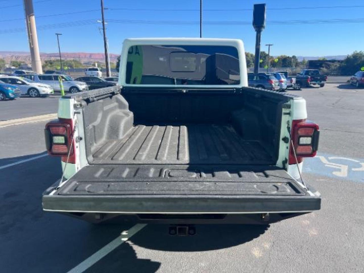 2021 Bright White Clearcoat /Red Jeep Gladiator Rubicon 4X4 (1C6JJTBG1ML) with an 3.6L V-6 DOHC engine, AUTOMATIC transmission, located at 1865 East Red Hills Pkwy, St. George, 84770, (435) 628-0023, 37.120850, -113.543640 - Classy red and white Gladiator rubicon with lift and tires. Great condition and drives straight. Specs: GVWR: 6,250 lbs w/Max Tow Package LED LIGHTING GROUP - AD6 Includes Daytime Running Lamps LED Accents LED Park Turn Lamps Front LED Fog Lamps LED Premium Reflector Headlamps LED Taillamps SA - Photo#25