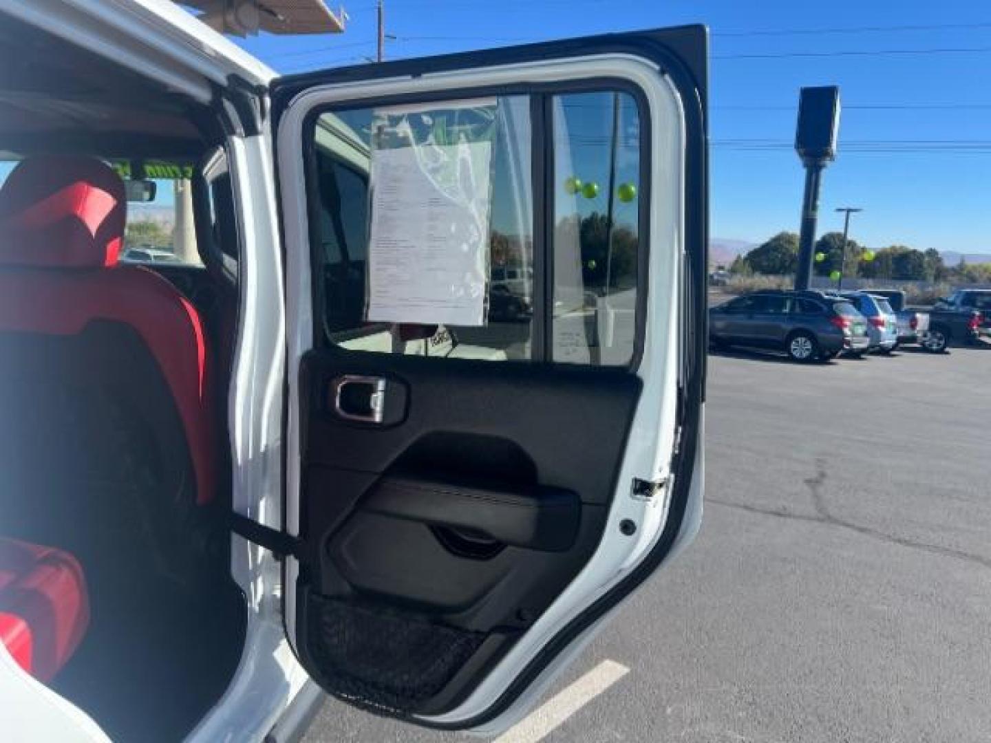 2021 Bright White Clearcoat /Red Jeep Gladiator Rubicon 4X4 (1C6JJTBG1ML) with an 3.6L V-6 DOHC engine, AUTOMATIC transmission, located at 1865 East Red Hills Pkwy, St. George, 84770, (435) 628-0023, 37.120850, -113.543640 - Classy red and white Gladiator rubicon with lift and tires. Great condition and drives straight. Specs: GVWR: 6,250 lbs w/Max Tow Package LED LIGHTING GROUP - AD6 Includes Daytime Running Lamps LED Accents LED Park Turn Lamps Front LED Fog Lamps LED Premium Reflector Headlamps LED Taillamps SA - Photo#26