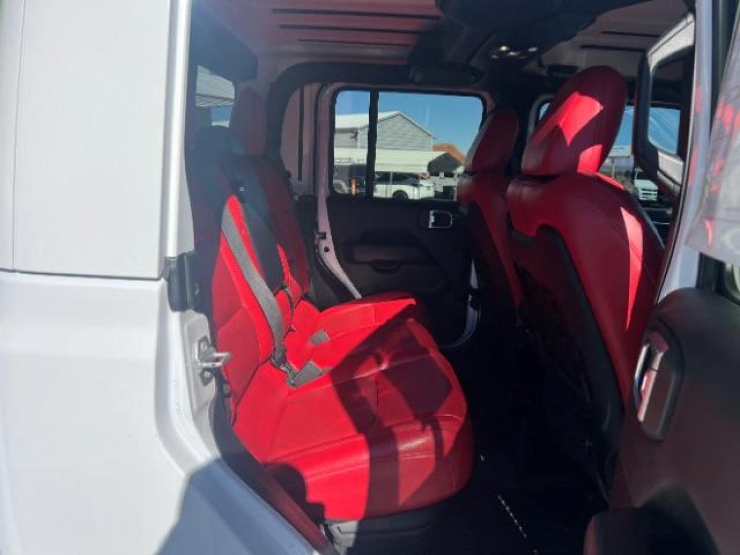 2021 Bright White Clearcoat /Red Jeep Gladiator Rubicon 4X4 (1C6JJTBG1ML) with an 3.6L V-6 DOHC engine, AUTOMATIC transmission, located at 1865 East Red Hills Pkwy, St. George, 84770, (435) 628-0023, 37.120850, -113.543640 - Classy red and white Gladiator rubicon with lift and tires. Great condition and drives straight. Specs: GVWR: 6,250 lbs w/Max Tow Package LED LIGHTING GROUP - AD6 Includes Daytime Running Lamps LED Accents LED Park Turn Lamps Front LED Fog Lamps LED Premium Reflector Headlamps LED Taillamps SA - Photo#27