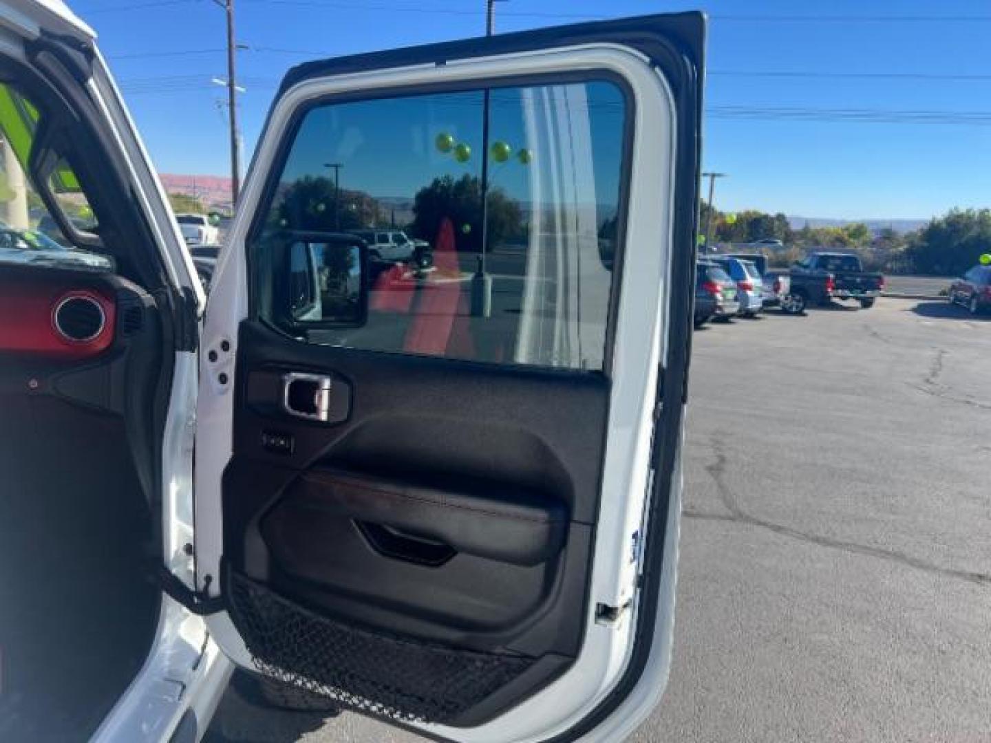 2021 Bright White Clearcoat /Red Jeep Gladiator Rubicon 4X4 (1C6JJTBG1ML) with an 3.6L V-6 DOHC engine, AUTOMATIC transmission, located at 1865 East Red Hills Pkwy, St. George, 84770, (435) 628-0023, 37.120850, -113.543640 - Classy red and white Gladiator rubicon with lift and tires. Great condition and drives straight. Specs: GVWR: 6,250 lbs w/Max Tow Package LED LIGHTING GROUP - AD6 Includes Daytime Running Lamps LED Accents LED Park Turn Lamps Front LED Fog Lamps LED Premium Reflector Headlamps LED Taillamps SA - Photo#28