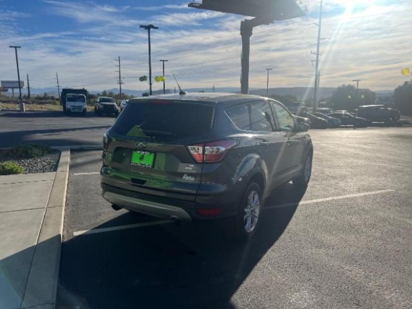 2017 Magnetic Metallic /Medium Light Stone Ford Escape SE (1FMCU9GD6HU) with an EcoBoost 1.5L I-4 gasoline direct injection engine, Automatic transmission, located at 1865 East Red Hills Pkwy, St. George, 84770, (435) 628-0023, 37.120850, -113.543640 - We specialize in helping ALL people get the best financing available. No matter your credit score, good, bad or none we can get you an amazing rate. Had a bankruptcy, divorce, or repossessions? We give you the green light to get your credit back on the road. Low down and affordable payments that fit - Photo#6