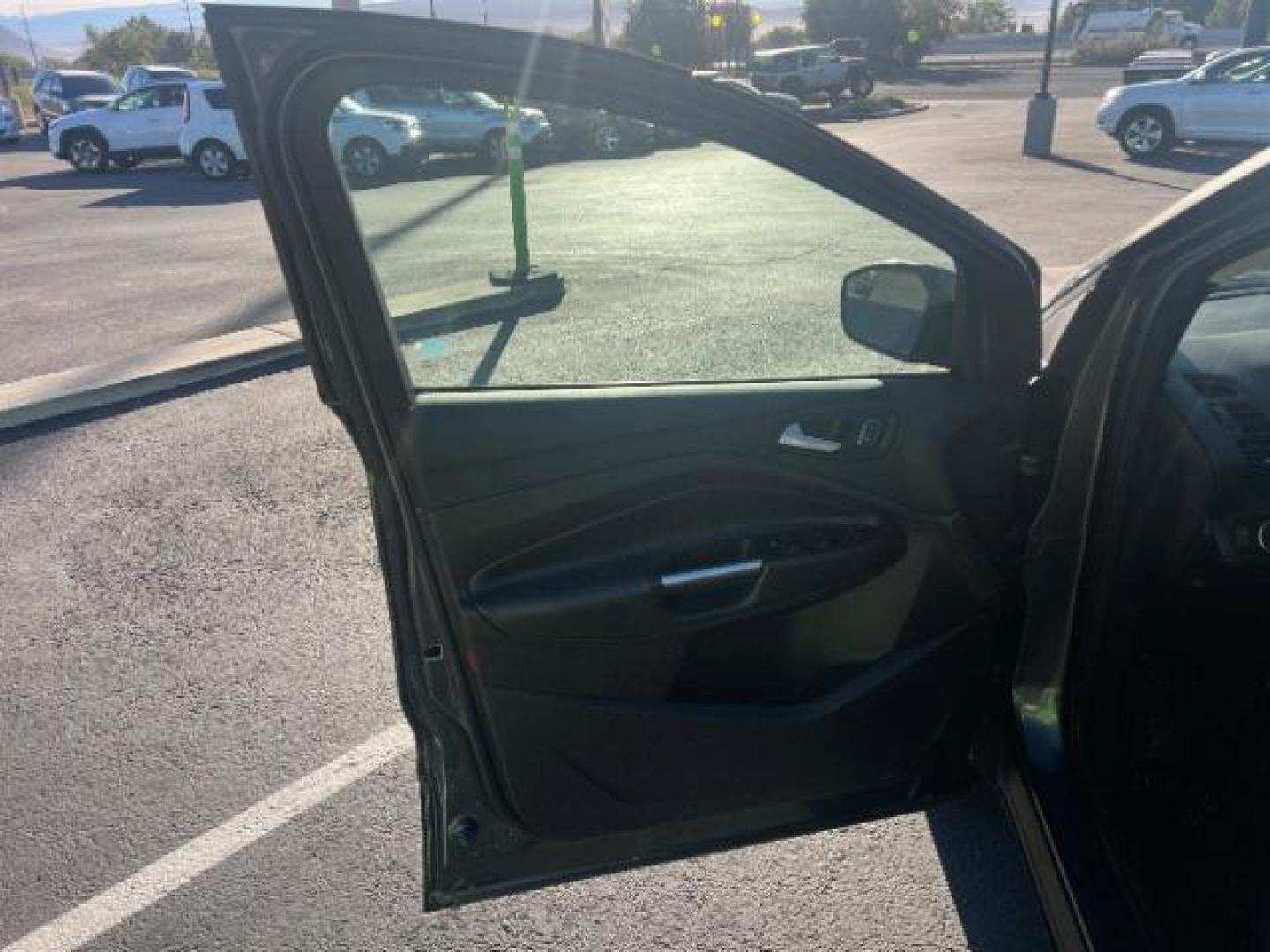 2017 Magnetic Metallic /Medium Light Stone Ford Escape SE (1FMCU9GD6HU) with an EcoBoost 1.5L I-4 gasoline direct injection engine, Automatic transmission, located at 1865 East Red Hills Pkwy, St. George, 84770, (435) 628-0023, 37.120850, -113.543640 - We specialize in helping ALL people get the best financing available. No matter your credit score, good, bad or none we can get you an amazing rate. Had a bankruptcy, divorce, or repossessions? We give you the green light to get your credit back on the road. Low down and affordable payments that fit - Photo#12