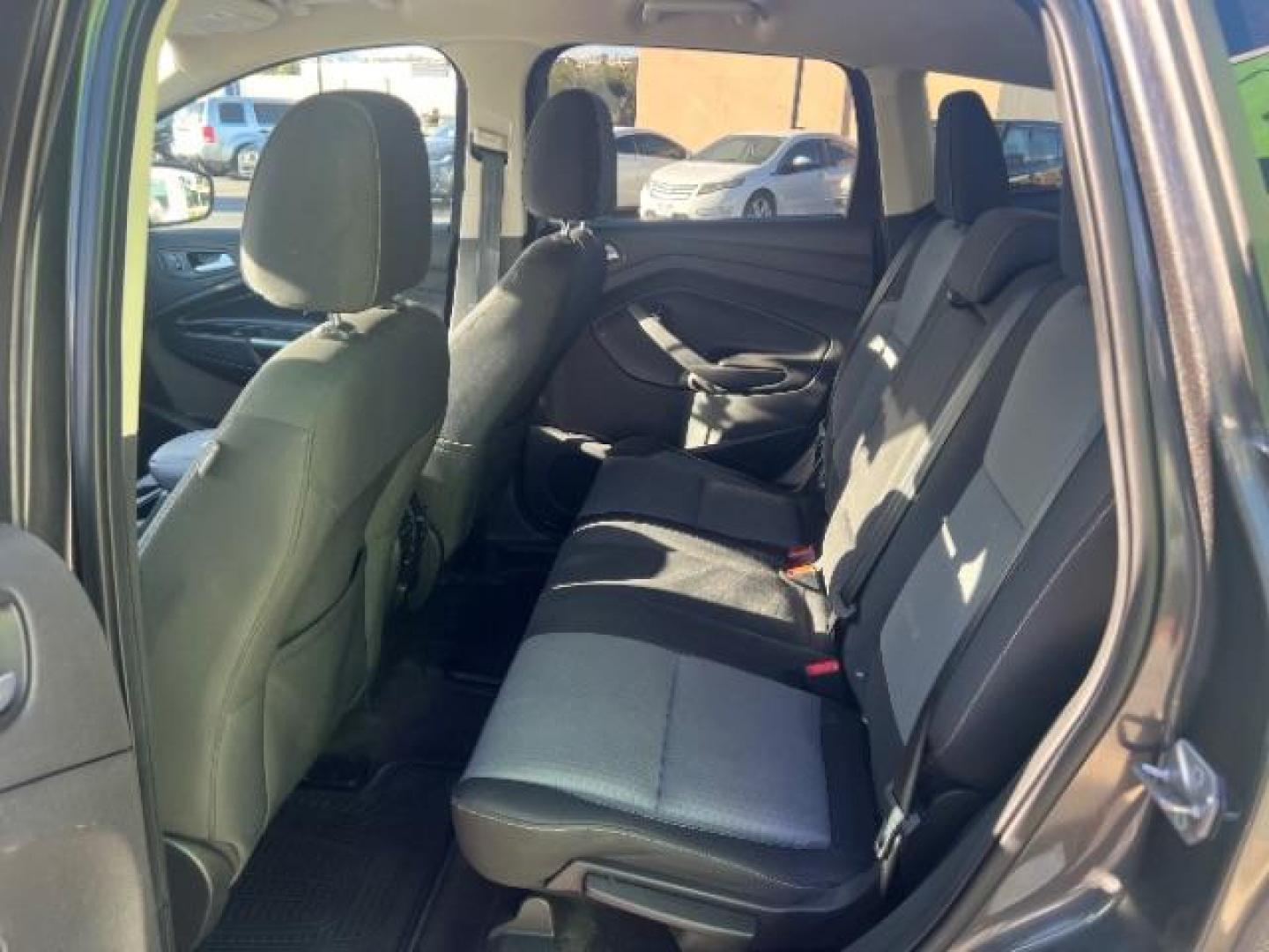 2017 Magnetic Metallic /Medium Light Stone Ford Escape SE (1FMCU9GD6HU) with an EcoBoost 1.5L I-4 gasoline direct injection engine, Automatic transmission, located at 1865 East Red Hills Pkwy, St. George, 84770, (435) 628-0023, 37.120850, -113.543640 - We specialize in helping ALL people get the best financing available. No matter your credit score, good, bad or none we can get you an amazing rate. Had a bankruptcy, divorce, or repossessions? We give you the green light to get your credit back on the road. Low down and affordable payments that fit - Photo#21