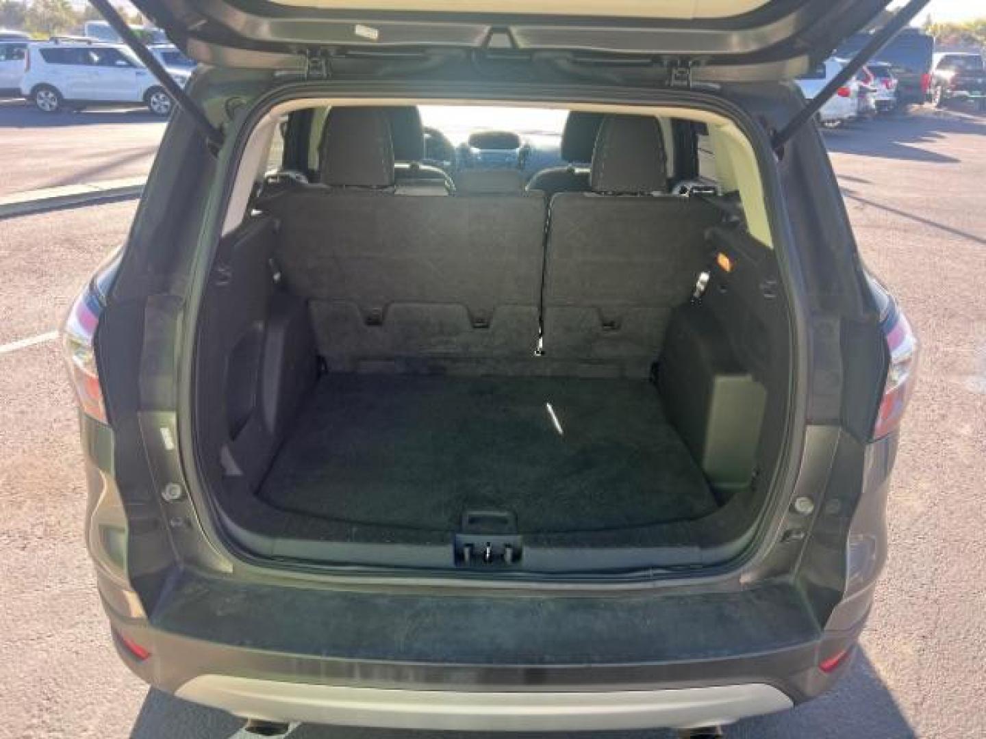 2017 Magnetic Metallic /Medium Light Stone Ford Escape SE (1FMCU9GD6HU) with an EcoBoost 1.5L I-4 gasoline direct injection engine, Automatic transmission, located at 1865 East Red Hills Pkwy, St. George, 84770, (435) 628-0023, 37.120850, -113.543640 - We specialize in helping ALL people get the best financing available. No matter your credit score, good, bad or none we can get you an amazing rate. Had a bankruptcy, divorce, or repossessions? We give you the green light to get your credit back on the road. Low down and affordable payments that fit - Photo#24