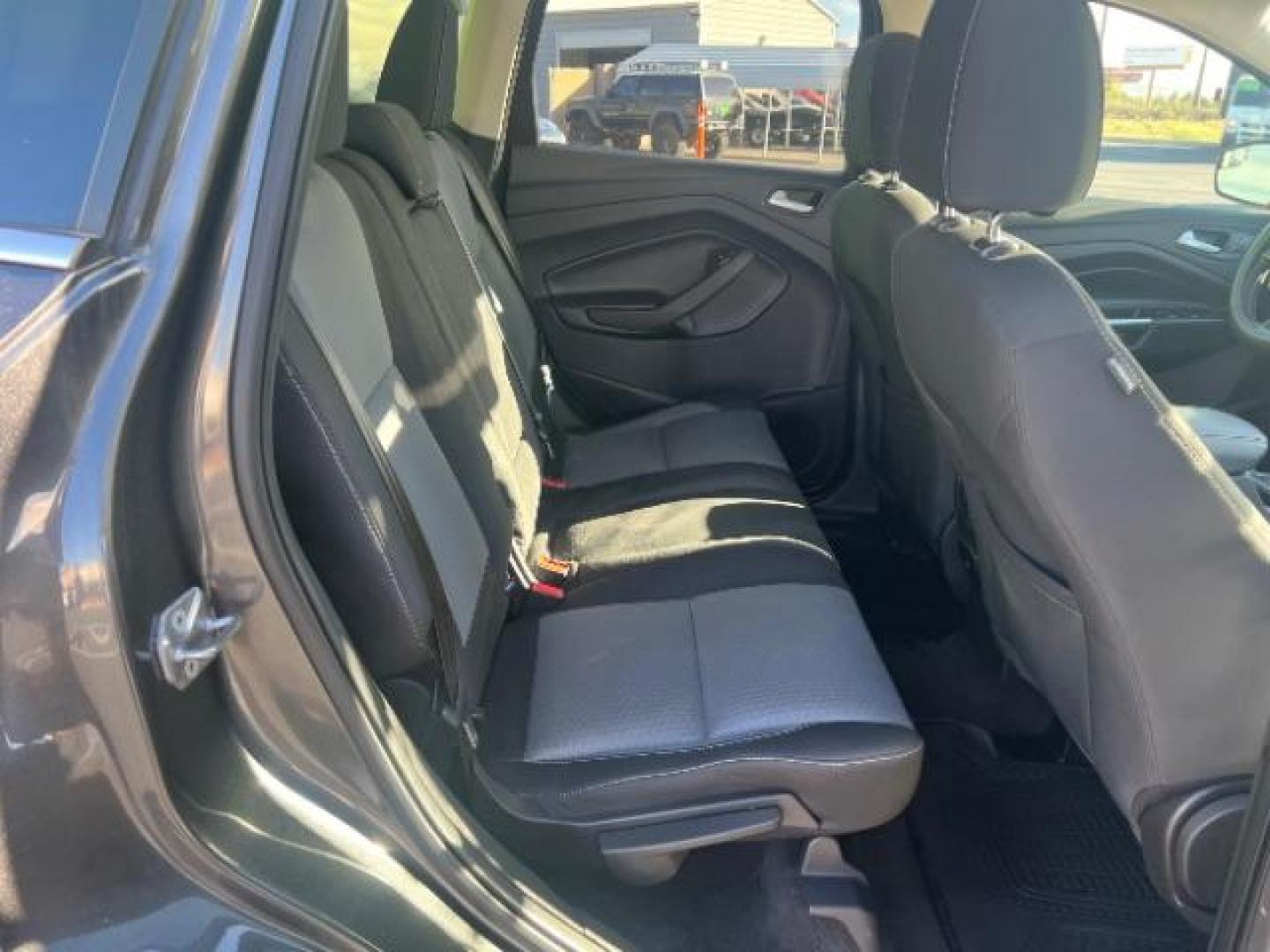 2017 Magnetic Metallic /Medium Light Stone Ford Escape SE (1FMCU9GD6HU) with an EcoBoost 1.5L I-4 gasoline direct injection engine, Automatic transmission, located at 1865 East Red Hills Pkwy, St. George, 84770, (435) 628-0023, 37.120850, -113.543640 - We specialize in helping ALL people get the best financing available. No matter your credit score, good, bad or none we can get you an amazing rate. Had a bankruptcy, divorce, or repossessions? We give you the green light to get your credit back on the road. Low down and affordable payments that fit - Photo#27