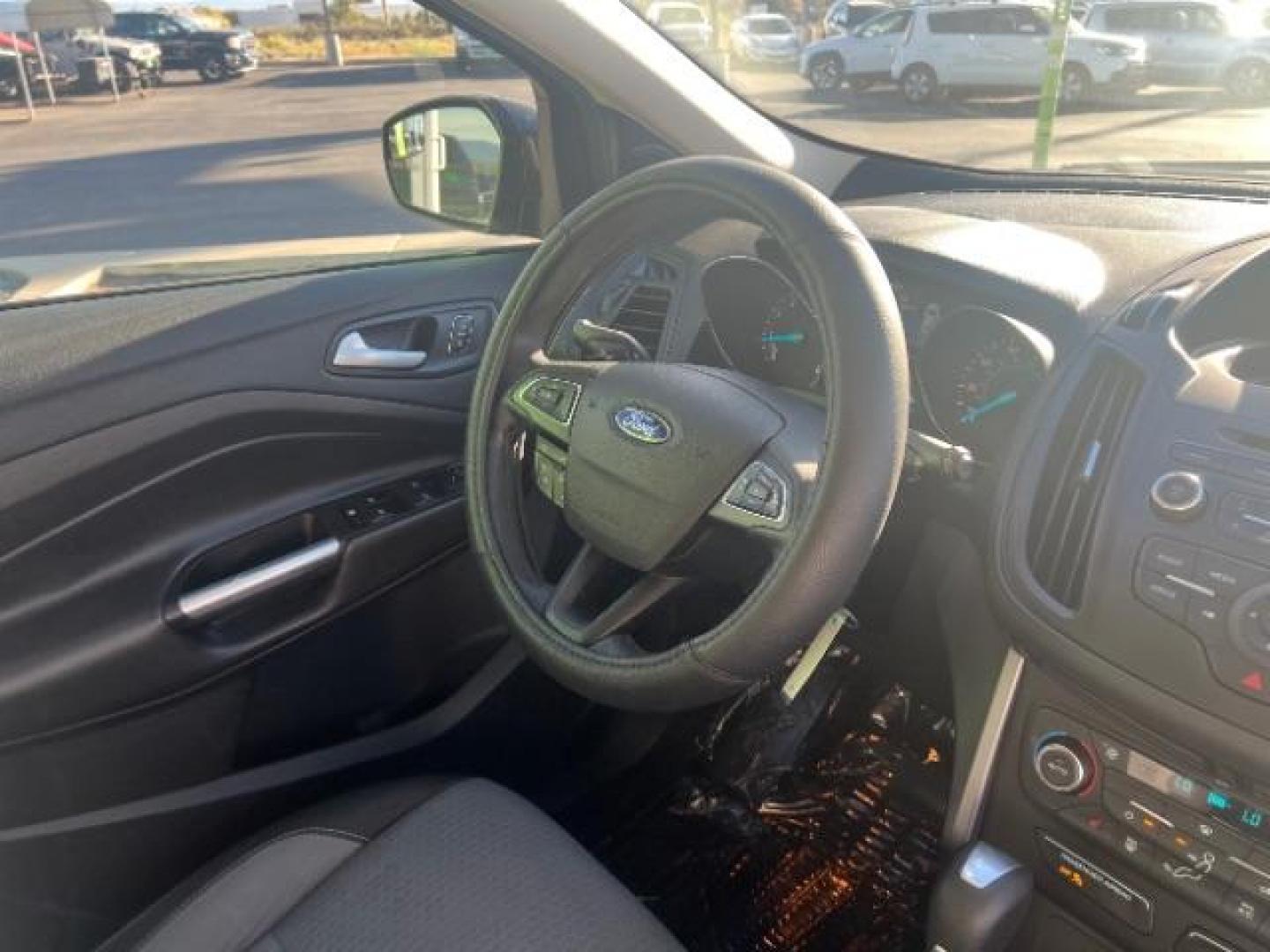 2017 Magnetic Metallic /Medium Light Stone Ford Escape SE (1FMCU9GD6HU) with an EcoBoost 1.5L I-4 gasoline direct injection engine, Automatic transmission, located at 1865 East Red Hills Pkwy, St. George, 84770, (435) 628-0023, 37.120850, -113.543640 - We specialize in helping ALL people get the best financing available. No matter your credit score, good, bad or none we can get you an amazing rate. Had a bankruptcy, divorce, or repossessions? We give you the green light to get your credit back on the road. Low down and affordable payments that fit - Photo#31