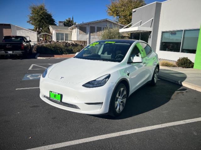 2022 Pearl White Multi-Coat /Black Tesla Model Y Long Range Dual Motor All-Wheel Drive (7SAYGAEEXNF) with an ELECTRIC engine, Automatic transmission, located at 1865 East Red Hills Pkwy, St. George, 84770, (435) 628-0023, 37.120850, -113.543640 - Excellent Tesla Model Y Long Range All Wheel Drive with 3rd row! 7 Seats! Battery is 90% healthy. Gets 290 on full charge. Still has remaining 120k mile Tesla warranty on battery and motor. We have aftermarkt battery warranties available. Southern Utah's Tesla Experts 4 Seasons Auto DL 7932 - Photo#4