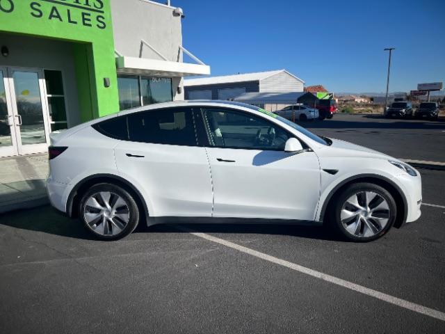 2022 Pearl White Multi-Coat /Black Tesla Model Y Long Range Dual Motor All-Wheel Drive (7SAYGAEEXNF) with an ELECTRIC engine, Automatic transmission, located at 1865 East Red Hills Pkwy, St. George, 84770, (435) 628-0023, 37.120850, -113.543640 - Excellent Tesla Model Y Long Range All Wheel Drive with 3rd row! 7 Seats! Battery is 90% healthy. Gets 290 on full charge. Still has remaining 120k mile Tesla warranty on battery and motor. We have aftermarkt battery warranties available. Southern Utah's Tesla Experts 4 Seasons Auto DL 7932 - Photo#9