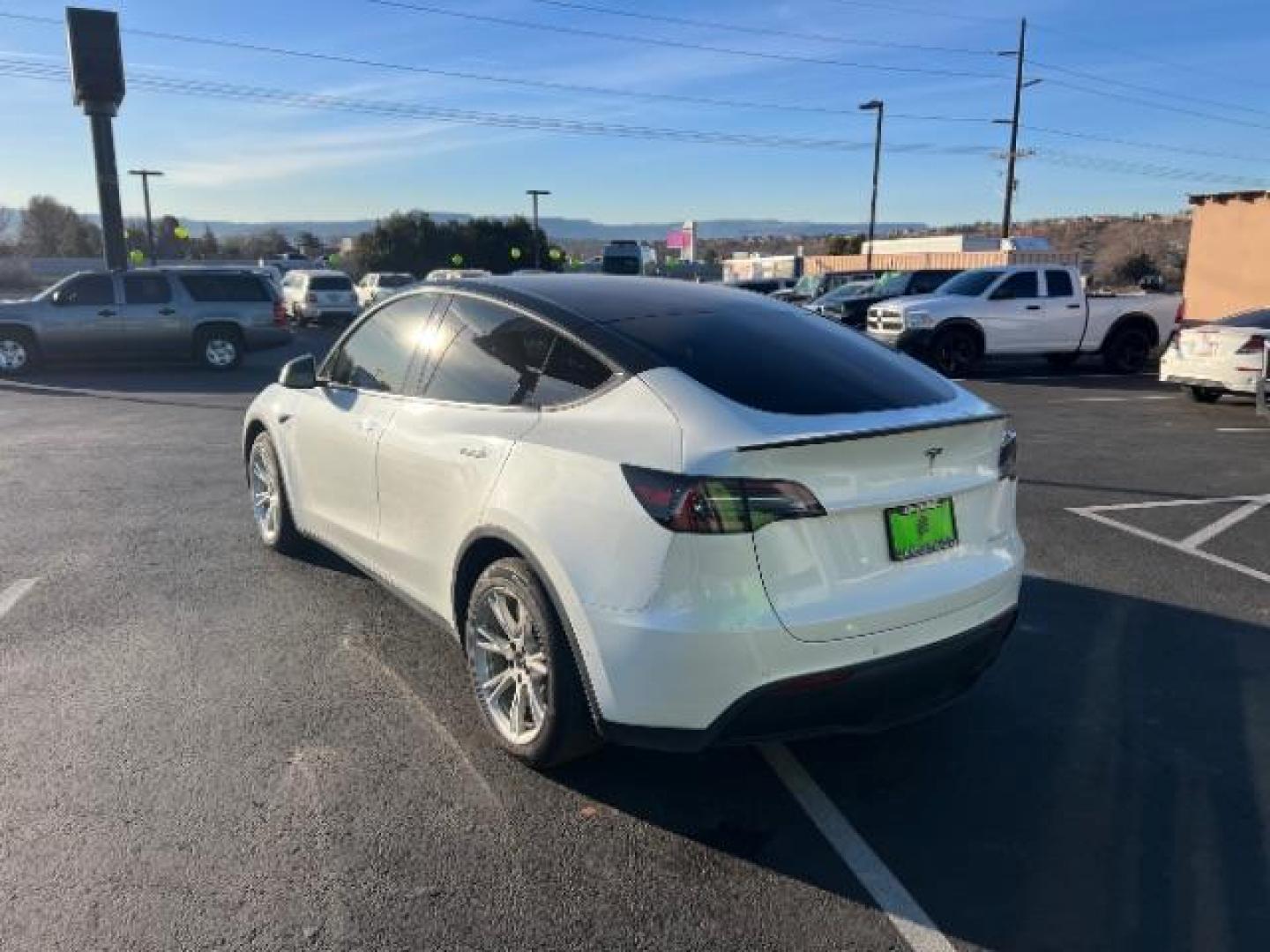 2022 Pearl White Multi-Coat /Black Tesla Model Y Long Range Dual Motor All-Wheel Drive (7SAYGAEEXNF) with an ELECTRIC engine, Automatic transmission, located at 1865 East Red Hills Pkwy, St. George, 84770, (435) 628-0023, 37.120850, -113.543640 - Photo#6