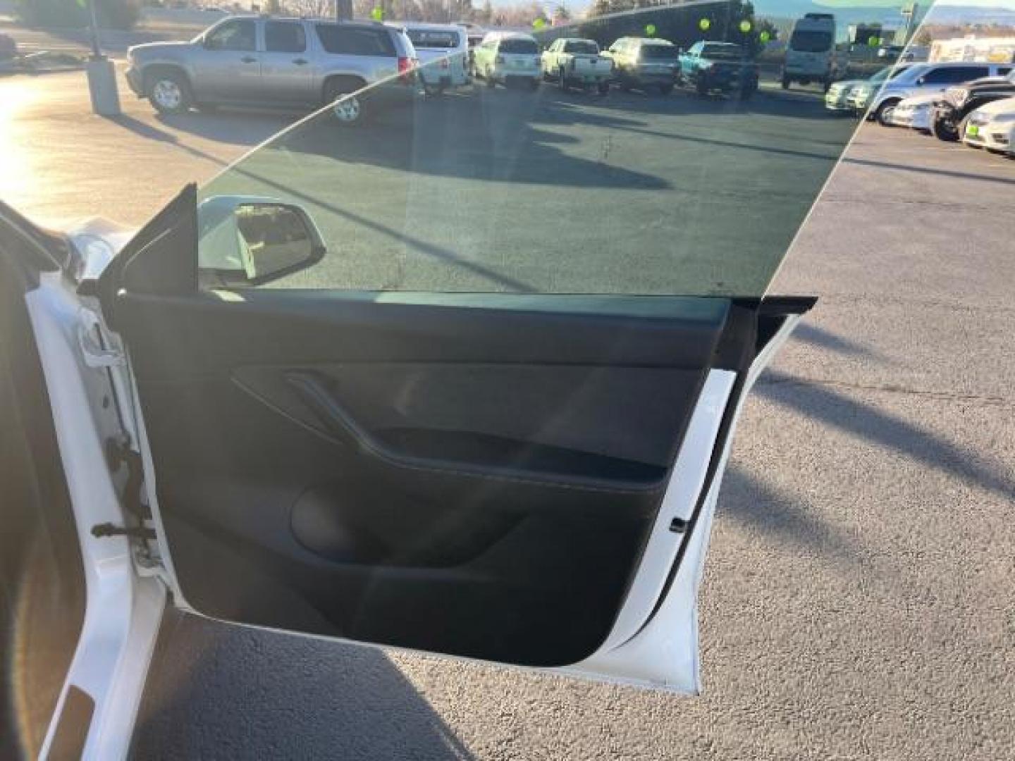 2022 Pearl White Multi-Coat /Black Tesla Model Y Long Range Dual Motor All-Wheel Drive (7SAYGAEEXNF) with an ELECTRIC engine, Automatic transmission, located at 1865 East Red Hills Pkwy, St. George, 84770, (435) 628-0023, 37.120850, -113.543640 - Photo#27