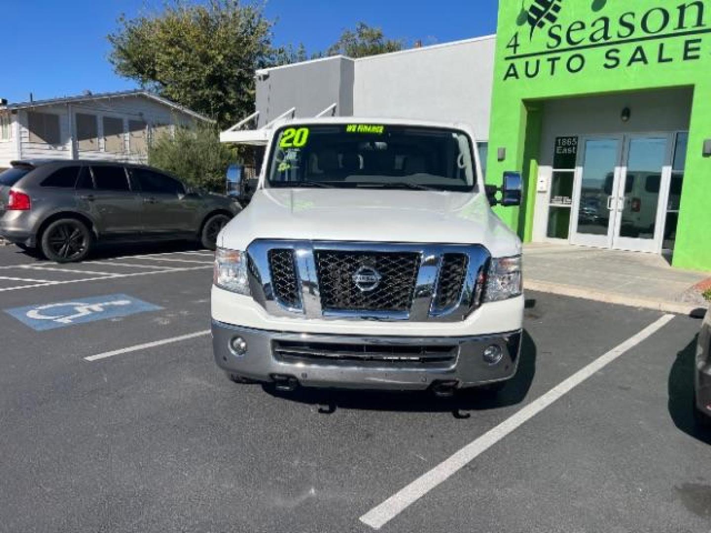 2020 Glacier White /Beige Nissan NV Passenger NV3500 HD SL (5BZAF0AA3LN) with an Endurance 5.6L V-8 gasoline direct injection engine, Automatic transmission, located at 1865 East Red Hills Pkwy, St. George, 84770, (435) 628-0023, 37.120850, -113.543640 - Spotless NV3500 SL ready for the whole family. 2wd but we can arrange the 4x4 convertions for you if desired. V8, Tow, Cruise control Other High Value Options: 3rd Row Seat Back-up Camera Bluetooth Connection Chrome Wheels Climate Control Fog Lamps Heated Front Seat Leather Seats Multi-Zo - Photo#1