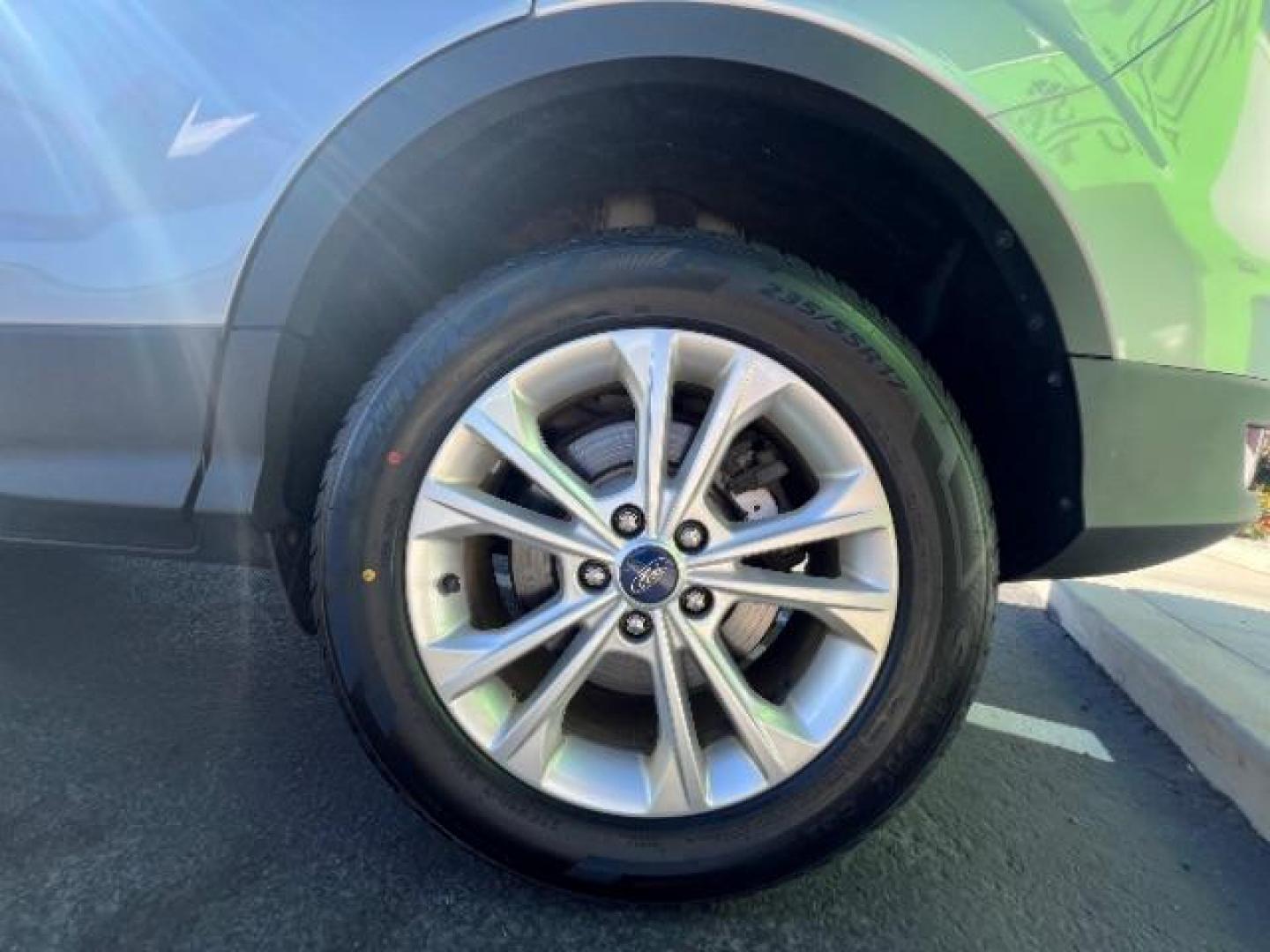 2017 Ingot Silver Metallic /Medium Light Stone Ford Escape SE (1FMCU9G96HU) with an EcoBoost 1.5L I-4 gasoline direct injection engine, Automatic transmission, located at 940 North Main Street, Cedar City, UT, 84720, (435) 628-0023, 37.692936, -113.061897 - Photo#10