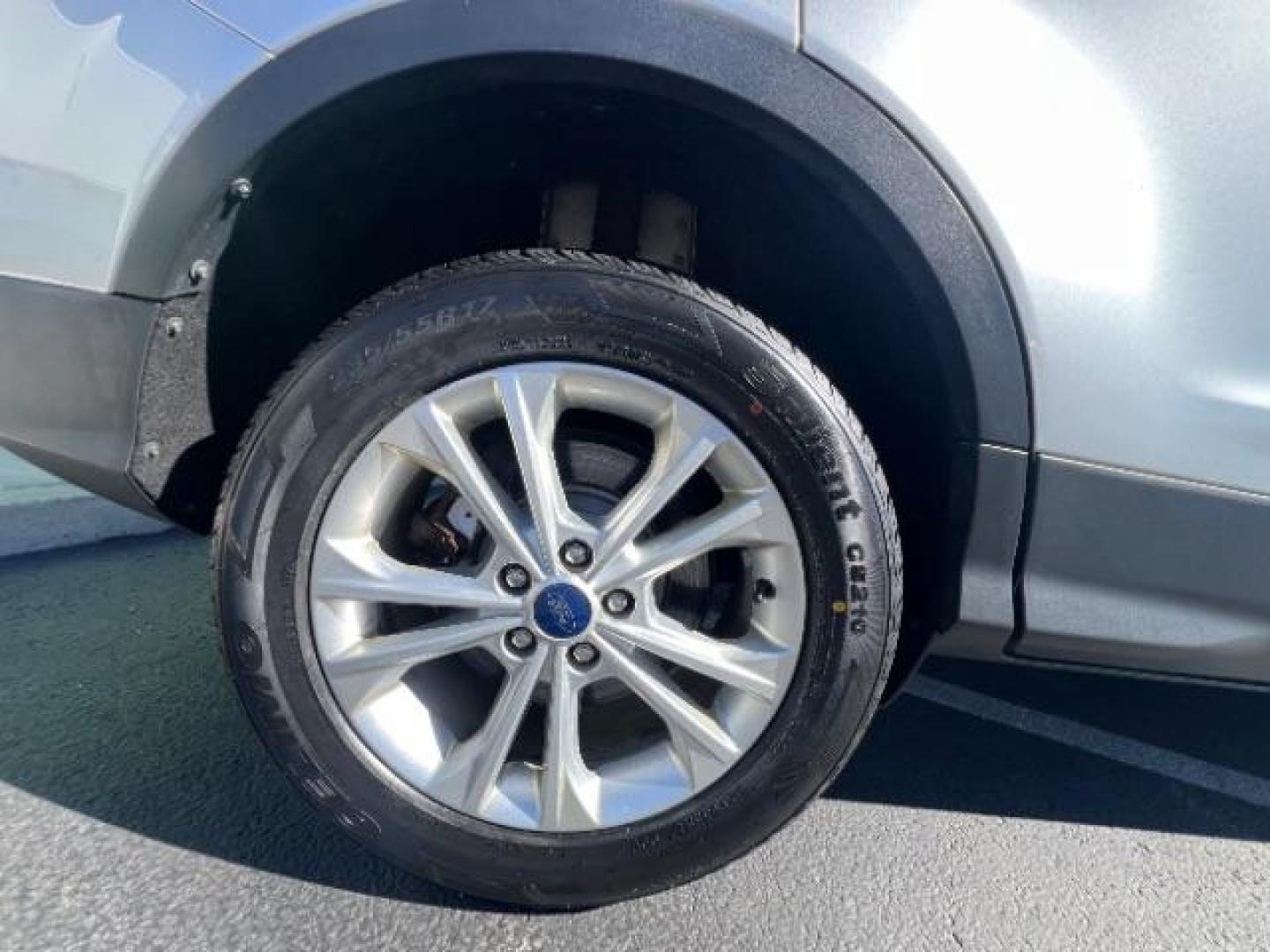 2017 Ingot Silver Metallic /Medium Light Stone Ford Escape SE (1FMCU9G96HU) with an EcoBoost 1.5L I-4 gasoline direct injection engine, Automatic transmission, located at 940 North Main Street, Cedar City, UT, 84720, (435) 628-0023, 37.692936, -113.061897 - Photo#11