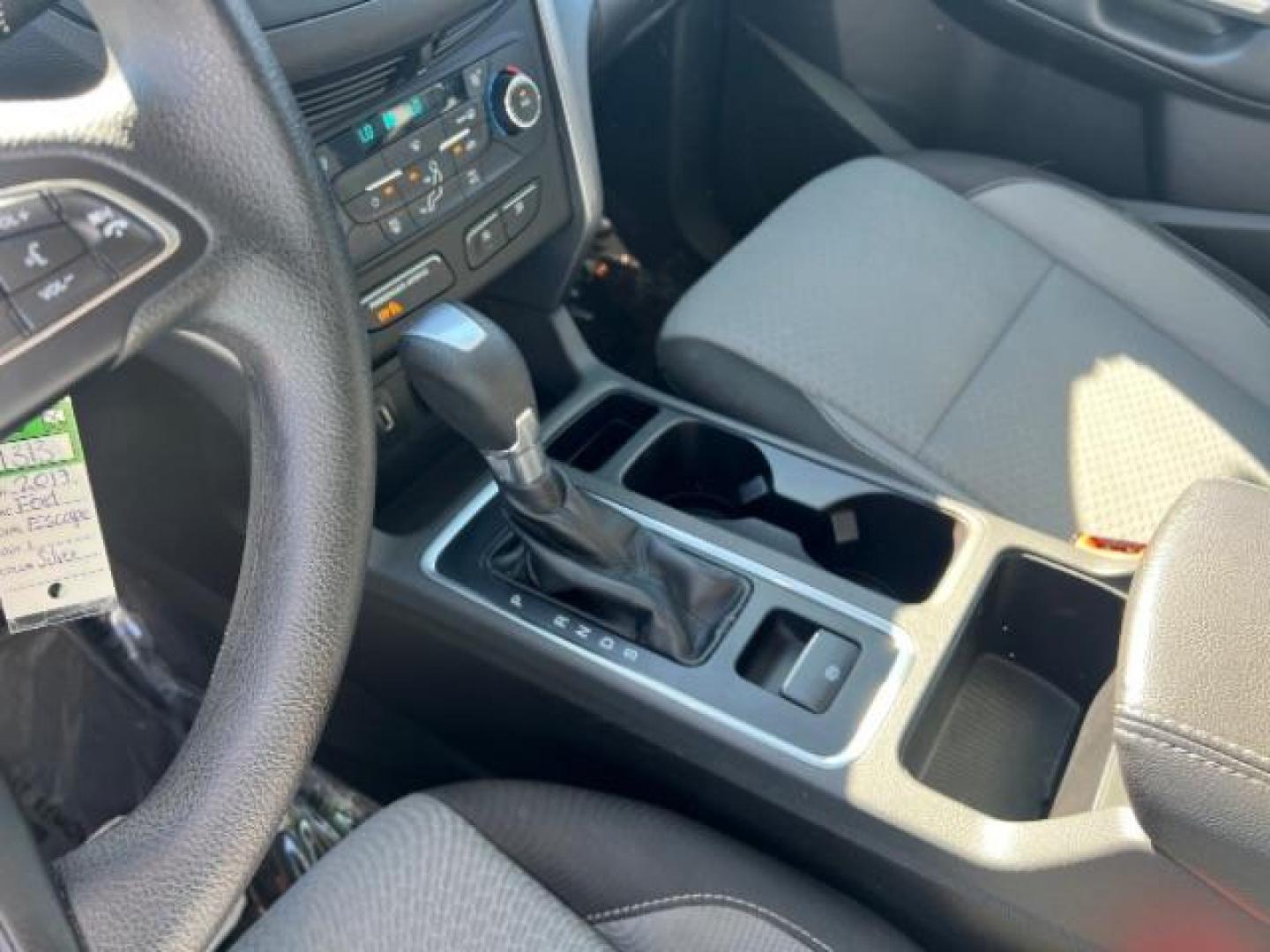 2017 Ingot Silver Metallic /Medium Light Stone Ford Escape SE (1FMCU9G96HU) with an EcoBoost 1.5L I-4 gasoline direct injection engine, Automatic transmission, located at 940 North Main Street, Cedar City, UT, 84720, (435) 628-0023, 37.692936, -113.061897 - Photo#17