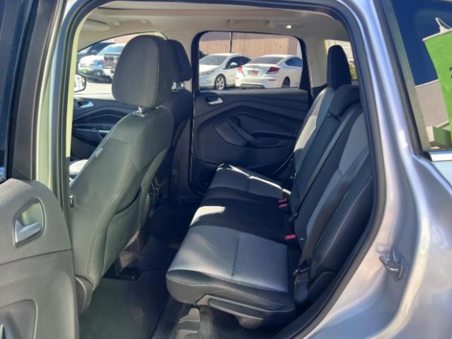 2017 Ingot Silver Metallic /Medium Light Stone Ford Escape SE (1FMCU9G96HU) with an EcoBoost 1.5L I-4 gasoline direct injection engine, Automatic transmission, located at 940 North Main Street, Cedar City, UT, 84720, (435) 628-0023, 37.692936, -113.061897 - Photo#20