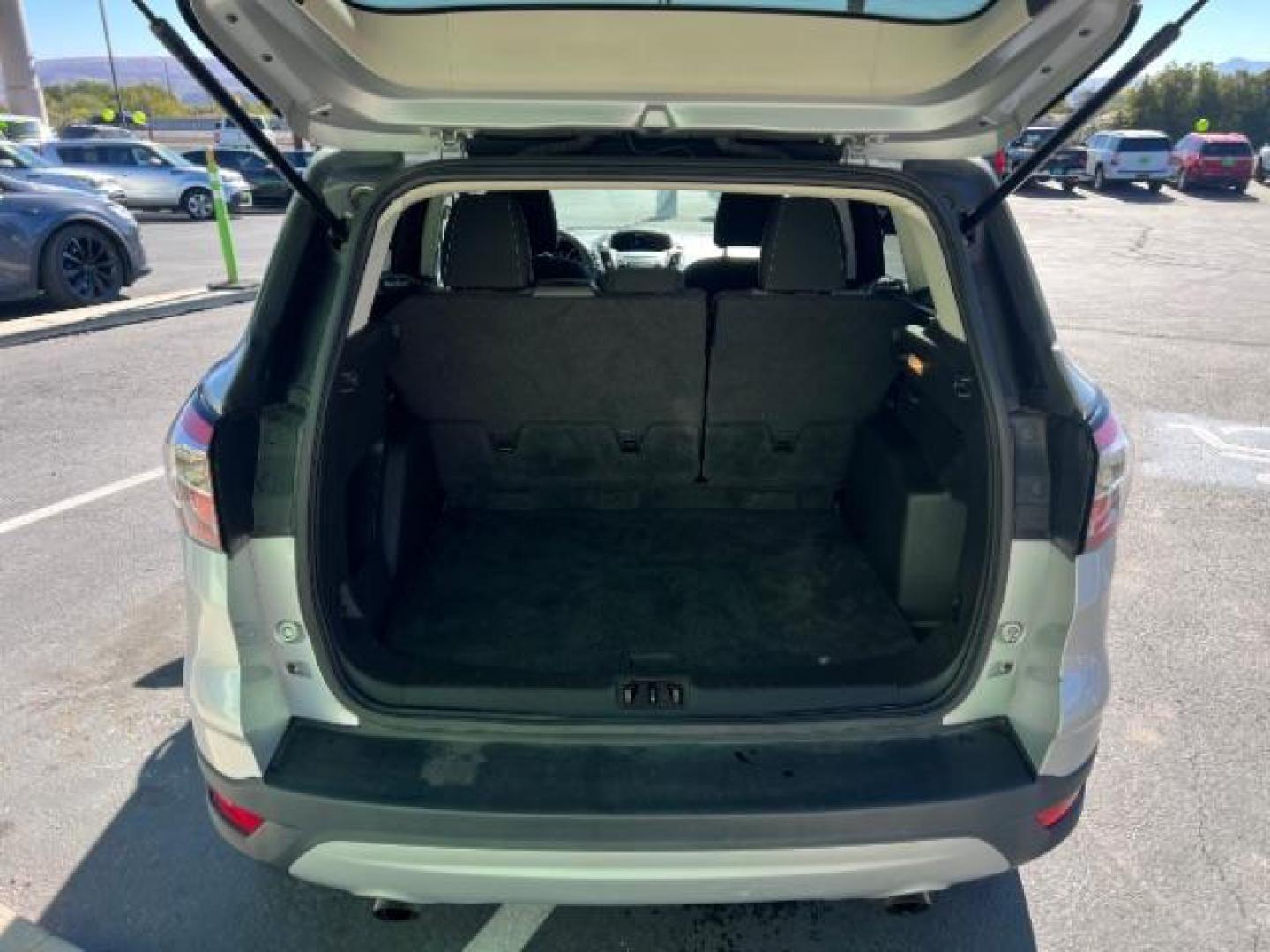 2017 Ingot Silver Metallic /Medium Light Stone Ford Escape SE (1FMCU9G96HU) with an EcoBoost 1.5L I-4 gasoline direct injection engine, Automatic transmission, located at 940 North Main Street, Cedar City, UT, 84720, (435) 628-0023, 37.692936, -113.061897 - Photo#23