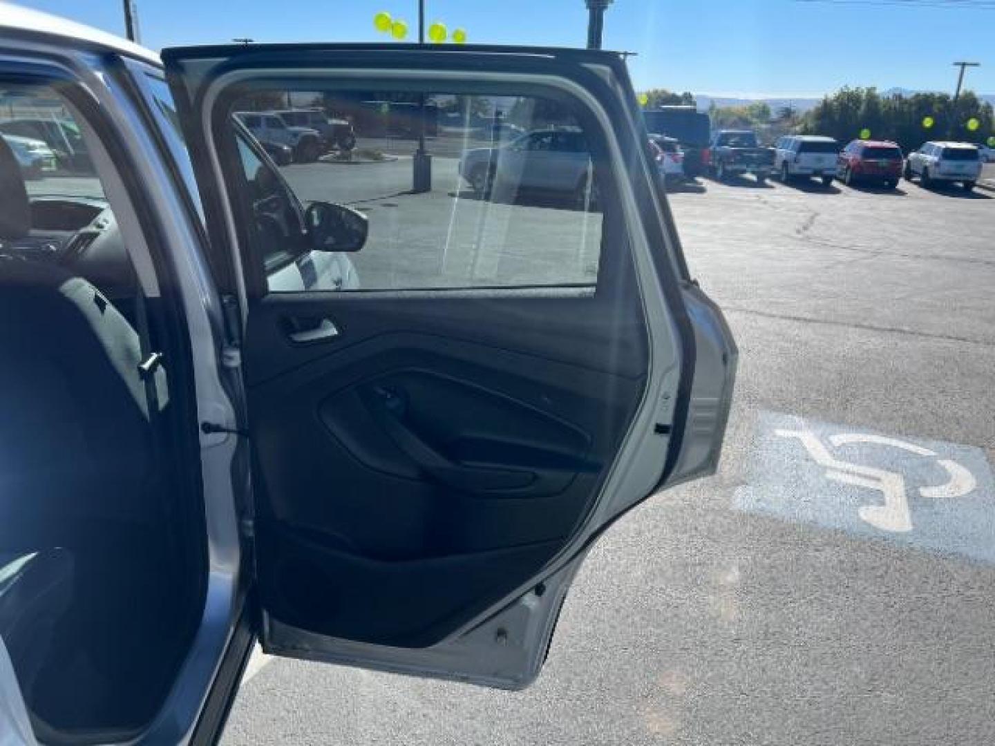 2017 Ingot Silver Metallic /Medium Light Stone Ford Escape SE (1FMCU9G96HU) with an EcoBoost 1.5L I-4 gasoline direct injection engine, Automatic transmission, located at 940 North Main Street, Cedar City, UT, 84720, (435) 628-0023, 37.692936, -113.061897 - Photo#24