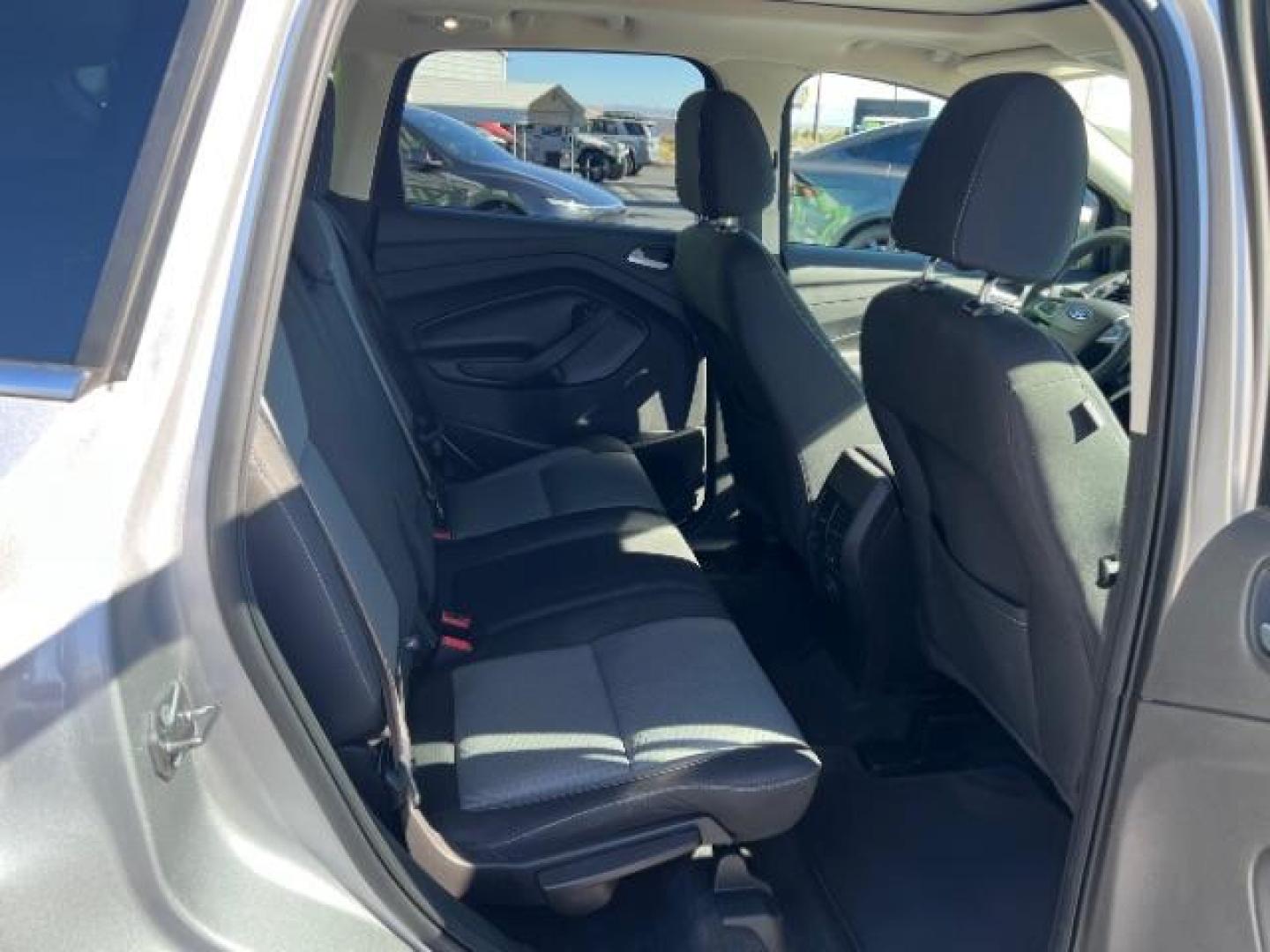 2017 Ingot Silver Metallic /Medium Light Stone Ford Escape SE (1FMCU9G96HU) with an EcoBoost 1.5L I-4 gasoline direct injection engine, Automatic transmission, located at 940 North Main Street, Cedar City, UT, 84720, (435) 628-0023, 37.692936, -113.061897 - Photo#25