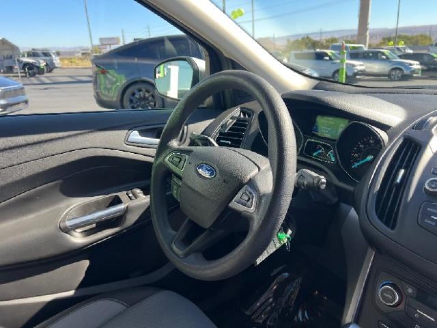 2017 Ingot Silver Metallic /Medium Light Stone Ford Escape SE (1FMCU9G96HU) with an EcoBoost 1.5L I-4 gasoline direct injection engine, Automatic transmission, located at 940 North Main Street, Cedar City, UT, 84720, (435) 628-0023, 37.692936, -113.061897 - Photo#29