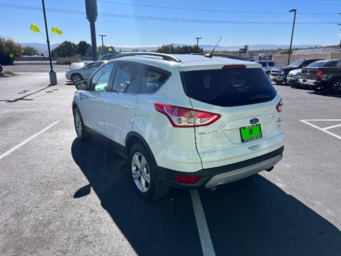 2016 Oxford White /Charcoal Black Ford Escape SE (1FMCU0GXXGU) , Automatic transmission, located at 1865 East Red Hills Pkwy, St. George, 84770, (435) 628-0023, 37.120850, -113.543640 - Photo#4