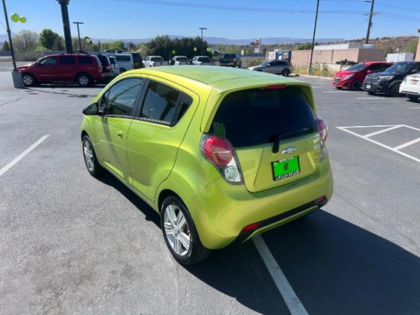 2014 Lime /Green w/Green Trim Chevrolet Spark 1LT Auto (KL8CD6S94EC) with an Ecotec 1.2L I-4 DOHC engine, Automatic transmission, located at 1865 East Red Hills Pkwy, St. George, 84770, (435) 628-0023, 37.120850, -113.543640 - Photo#4