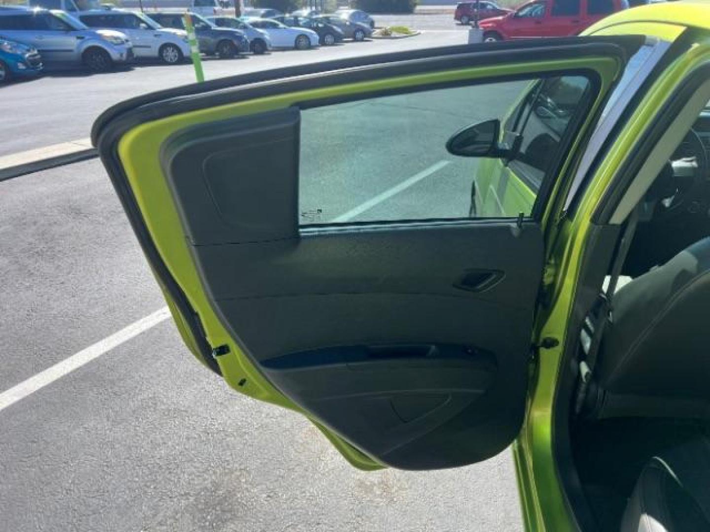 2014 Lime /Green w/Green Trim Chevrolet Spark 1LT Auto (KL8CD6S94EC) with an Ecotec 1.2L I-4 DOHC engine, Automatic transmission, located at 1865 East Red Hills Pkwy, St. George, 84770, (435) 628-0023, 37.120850, -113.543640 - Photo#19