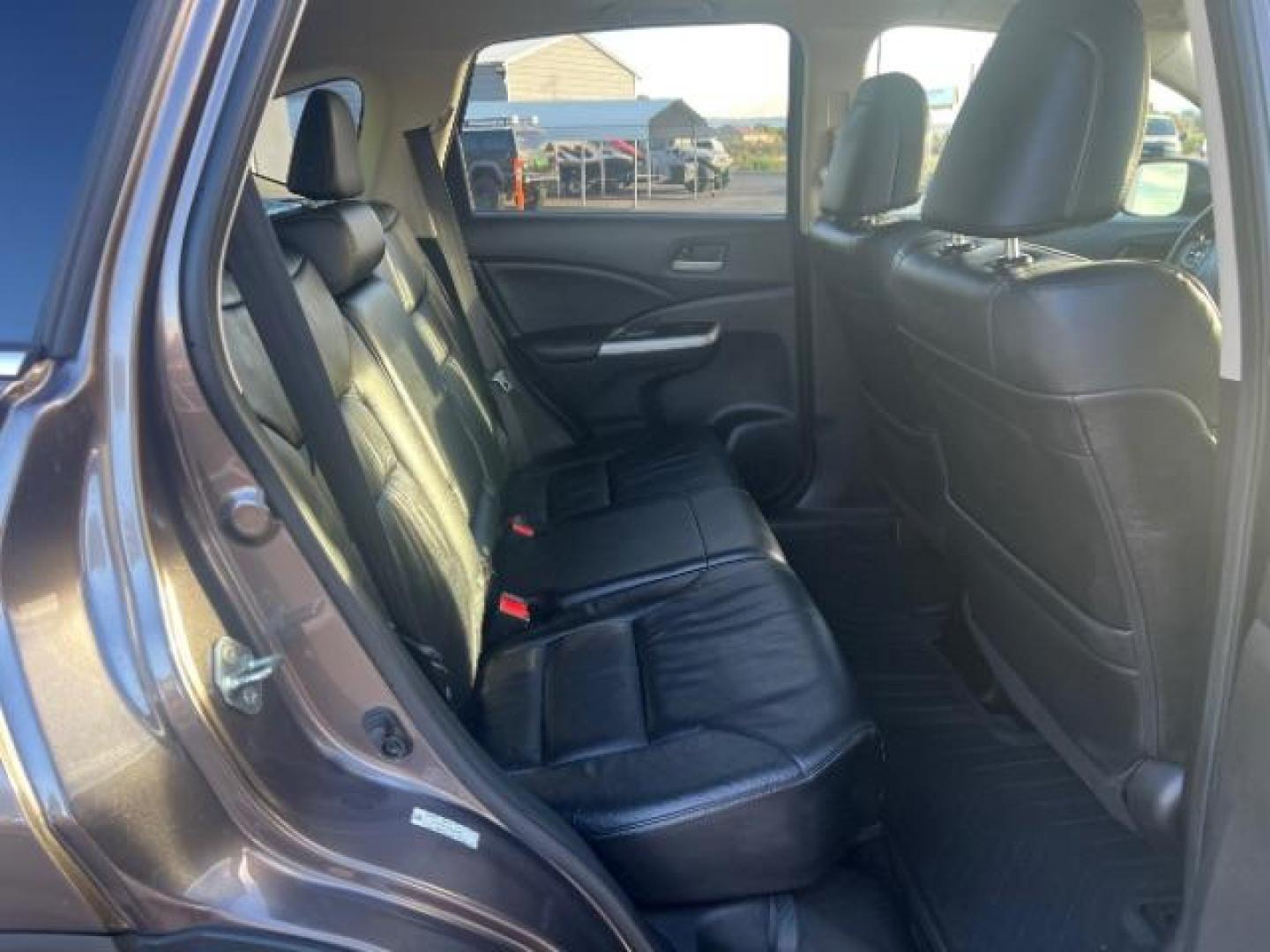 2014 Polished Metal Metallic /Black Honda CR-V EX-L (2HKRM4H7XEH) with an 2.4L I-4 DOHC engine, Automatic transmission, located at 1865 East Red Hills Pkwy, St. George, 84770, (435) 628-0023, 37.120850, -113.543640 - We specialize in helping ALL people get the best financing available. No matter your credit score, good, bad or none we can get you an amazing rate. Had a bankruptcy, divorce, or repossessions? We give you the green light to get your credit back on the road. Low down and affordable payments that fit - Photo#26