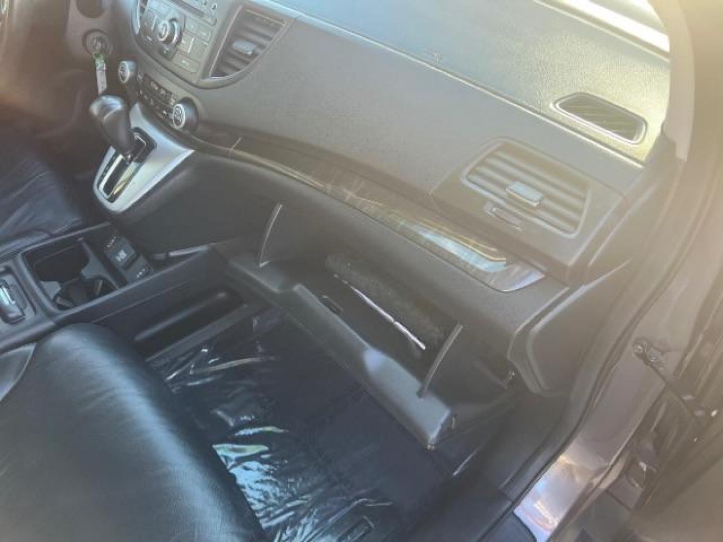 2014 Polished Metal Metallic /Black Honda CR-V EX-L (2HKRM4H7XEH) with an 2.4L I-4 DOHC engine, Automatic transmission, located at 1865 East Red Hills Pkwy, St. George, 84770, (435) 628-0023, 37.120850, -113.543640 - We specialize in helping ALL people get the best financing available. No matter your credit score, good, bad or none we can get you an amazing rate. Had a bankruptcy, divorce, or repossessions? We give you the green light to get your credit back on the road. Low down and affordable payments that fit - Photo#29