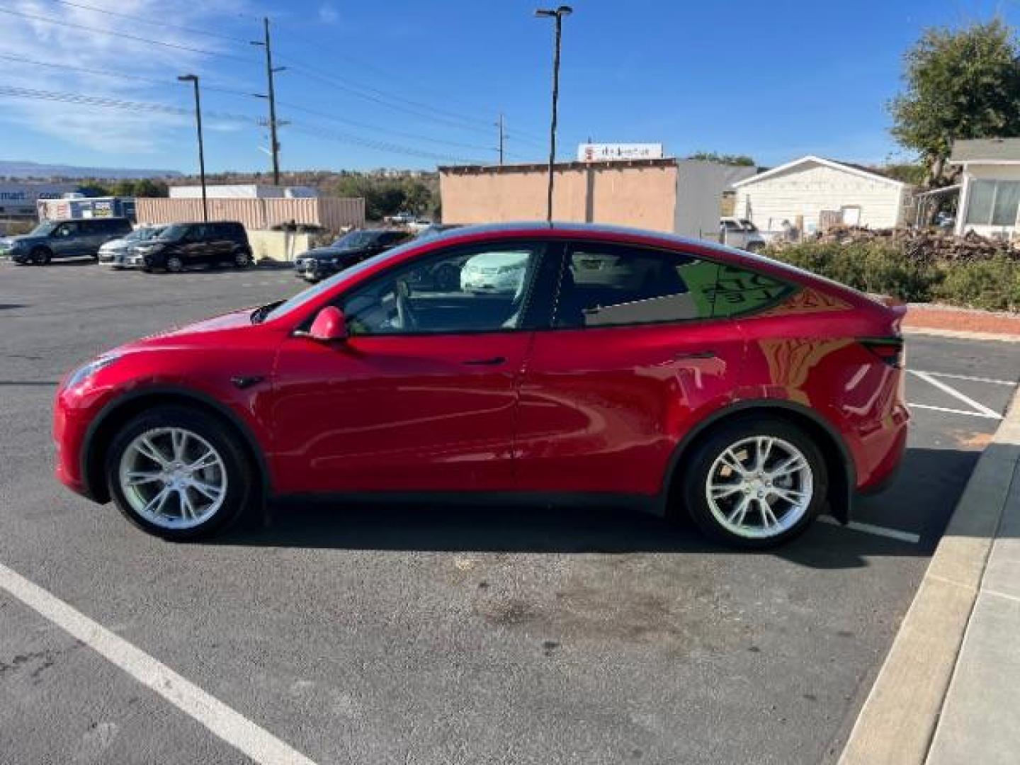 2023 Red Multi-Coat /Black Tesla Model Y Long Range Dual Motor All-Wheel Drive | AWD (7SAYGAEE6PF) with an ELECTRIC engine, Electric transmission, located at 1865 East Red Hills Pkwy, St. George, 84770, (435) 628-0023, 37.120850, -113.543640 - Photo#5