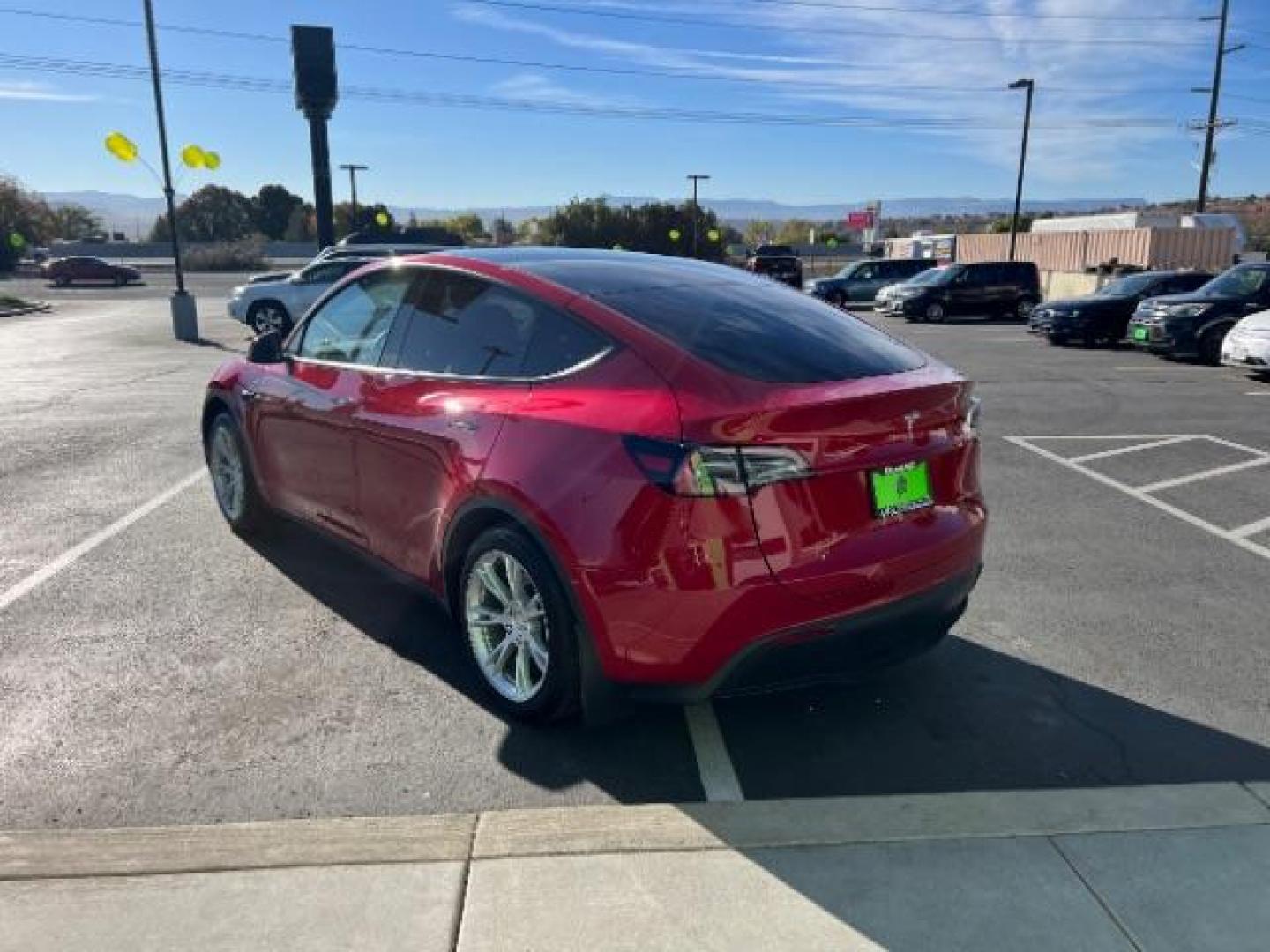 2023 Red Multi-Coat /Black Tesla Model Y Long Range Dual Motor All-Wheel Drive | AWD (7SAYGAEE6PF) with an ELECTRIC engine, Electric transmission, located at 1865 East Red Hills Pkwy, St. George, 84770, (435) 628-0023, 37.120850, -113.543640 - Photo#6