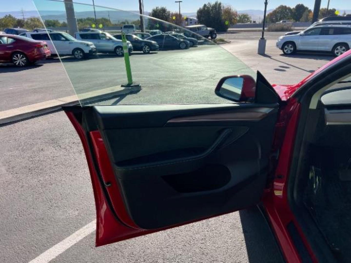 2023 Red Multi-Coat /Black Tesla Model Y Long Range Dual Motor All-Wheel Drive | AWD (7SAYGAEE6PF) with an ELECTRIC engine, Electric transmission, located at 1865 East Red Hills Pkwy, St. George, 84770, (435) 628-0023, 37.120850, -113.543640 - Photo#14