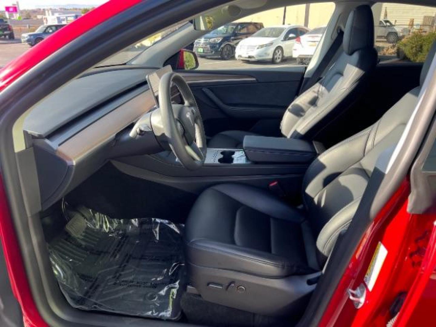 2023 Red Multi-Coat /Black Tesla Model Y Long Range Dual Motor All-Wheel Drive | AWD (7SAYGAEE6PF) with an ELECTRIC engine, Electric transmission, located at 1865 East Red Hills Pkwy, St. George, 84770, (435) 628-0023, 37.120850, -113.543640 - Photo#16