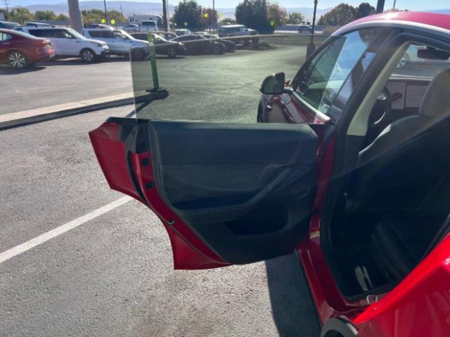 2023 Red Multi-Coat /Black Tesla Model Y Long Range Dual Motor All-Wheel Drive | AWD (7SAYGAEE6PF) with an ELECTRIC engine, Electric transmission, located at 1865 East Red Hills Pkwy, St. George, 84770, (435) 628-0023, 37.120850, -113.543640 - Photo#20