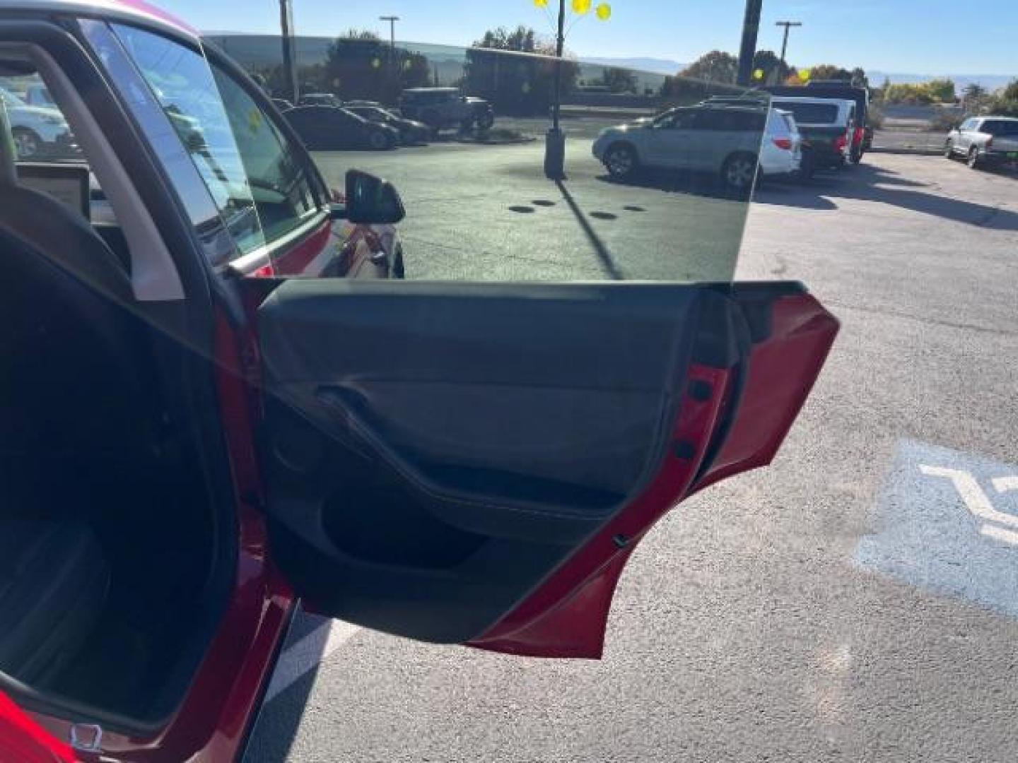 2023 Red Multi-Coat /Black Tesla Model Y Long Range Dual Motor All-Wheel Drive | AWD (7SAYGAEE6PF) with an ELECTRIC engine, Electric transmission, located at 1865 East Red Hills Pkwy, St. George, 84770, (435) 628-0023, 37.120850, -113.543640 - Photo#26