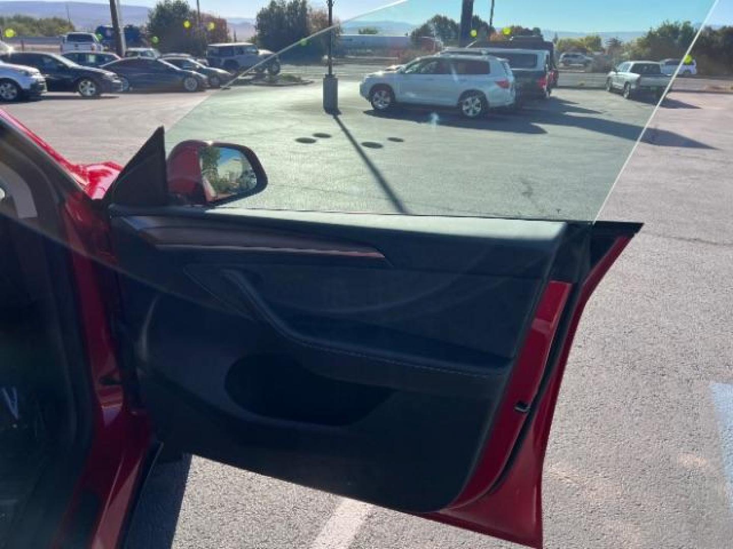 2023 Red Multi-Coat /Black Tesla Model Y Long Range Dual Motor All-Wheel Drive | AWD (7SAYGAEE6PF) with an ELECTRIC engine, Electric transmission, located at 1865 East Red Hills Pkwy, St. George, 84770, (435) 628-0023, 37.120850, -113.543640 - Photo#28