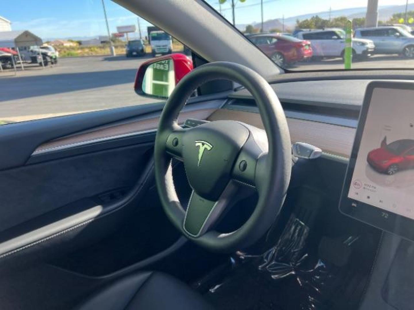 2023 Red Multi-Coat /Black Tesla Model Y Long Range Dual Motor All-Wheel Drive | AWD (7SAYGAEE6PF) with an ELECTRIC engine, Electric transmission, located at 1865 East Red Hills Pkwy, St. George, 84770, (435) 628-0023, 37.120850, -113.543640 - Photo#30