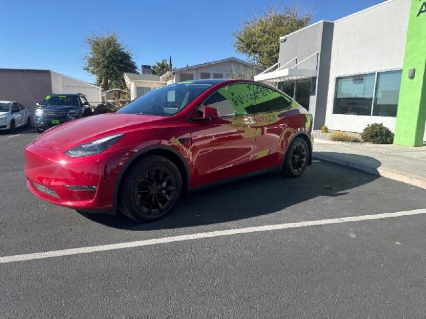 2023 Red Multi-Coat /Black Tesla Model Y Long Range Dual Motor All-Wheel Drive | AWD (7SAYGAEE6PF) with an ELECTRIC engine, Electric transmission, located at 1865 East Red Hills Pkwy, St. George, 84770, (435) 628-0023, 37.120850, -113.543640 - This has HW4 the most current Full Self Driving hardware AND 3rd row. 7 seats, excellent condition. 1 owner, NO accidents, Tow hitch. Battery is 98% healthy, Charges to 300 miles. Warrany: Bumper to bumper until Dec 2027 or 50k miles. Motor and Battery warranty up to Dec 2031 or 120k miles Your - Photo#2