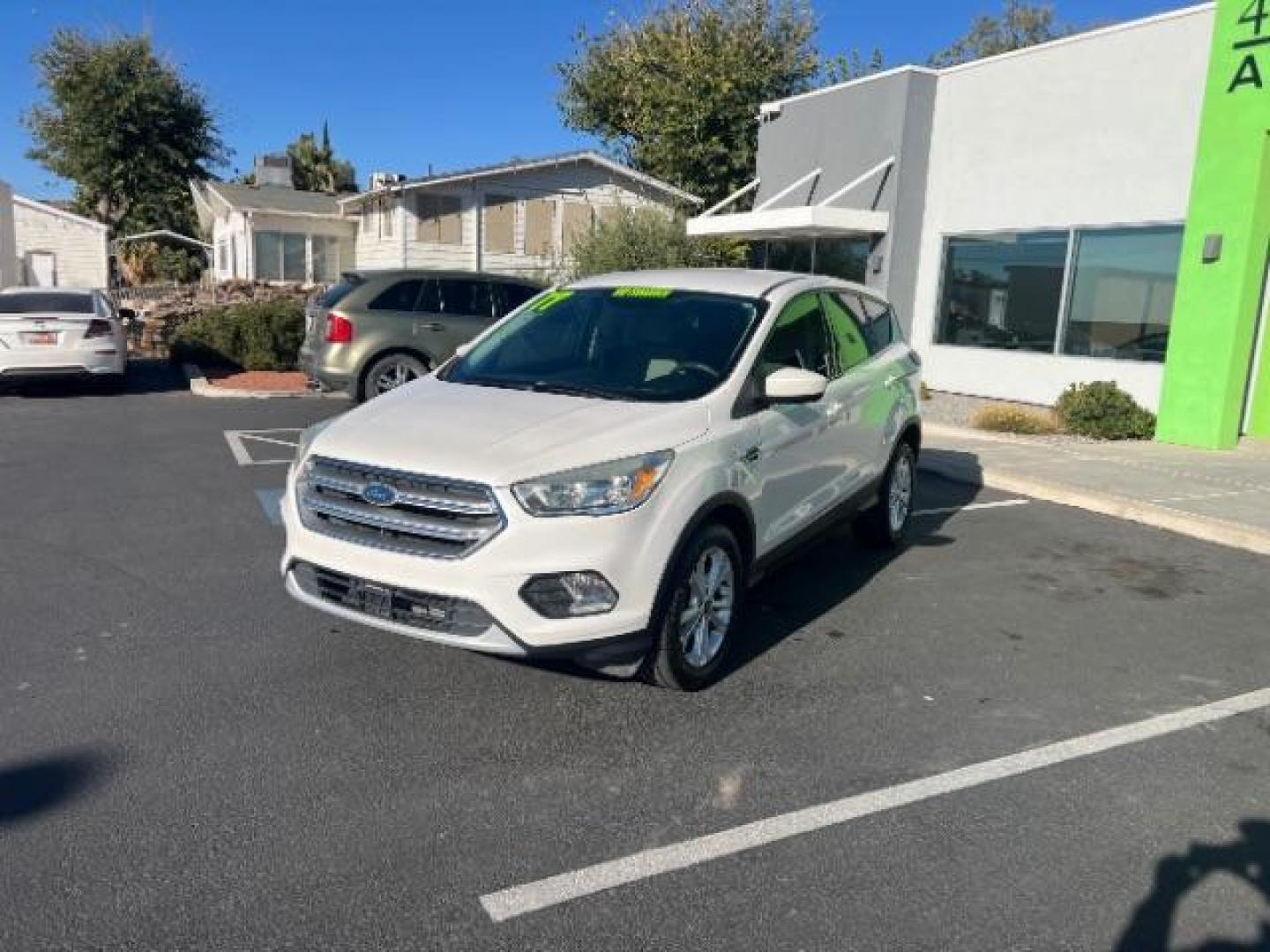 2017 Oxford White /Medium Light Stone Ford Escape SE (1FMCU0G91HU) with an EcoBoost 1.5L I-4 gasoline direct injection engine, Automatic transmission, located at 1865 East Red Hills Pkwy, St. George, 84770, (435) 628-0023, 37.120850, -113.543640 - We specialize in helping ALL people get the best financing available. No matter your credit score, good, bad or none we can get you an amazing rate. Had a bankruptcy, divorce, or repossessions? We give you the green light to get your credit back on the road. Low down and affordable payments that fit - Photo#2