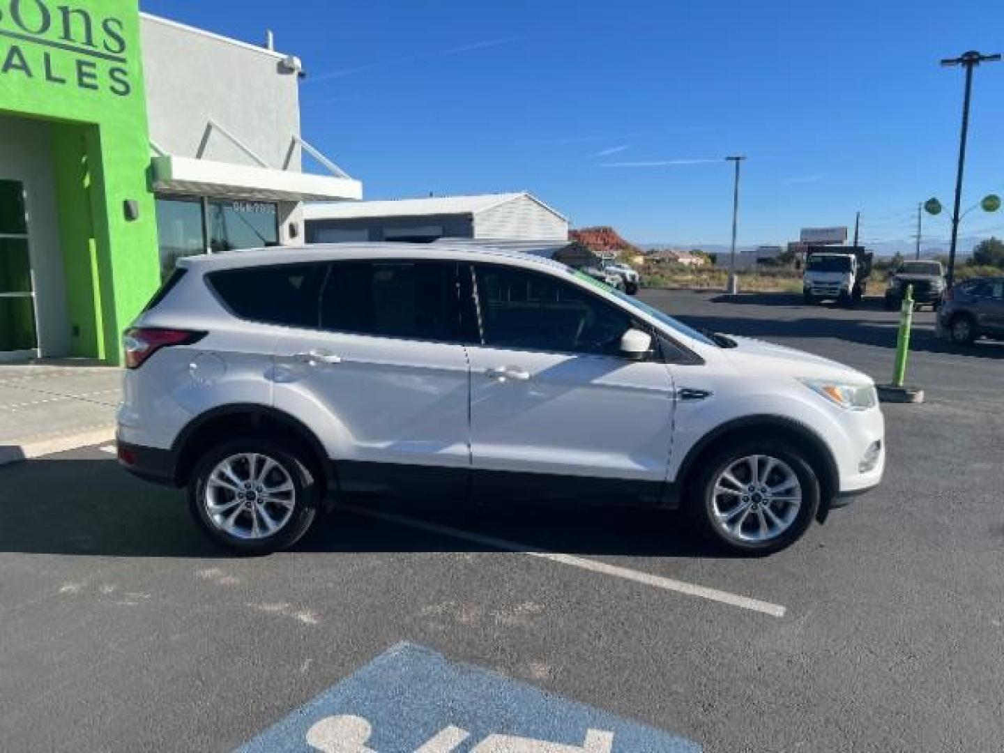 2017 Oxford White /Medium Light Stone Ford Escape SE (1FMCU0G91HU) with an EcoBoost 1.5L I-4 gasoline direct injection engine, Automatic transmission, located at 1865 East Red Hills Pkwy, St. George, 84770, (435) 628-0023, 37.120850, -113.543640 - We specialize in helping ALL people get the best financing available. No matter your credit score, good, bad or none we can get you an amazing rate. Had a bankruptcy, divorce, or repossessions? We give you the green light to get your credit back on the road. Low down and affordable payments that fit - Photo#7