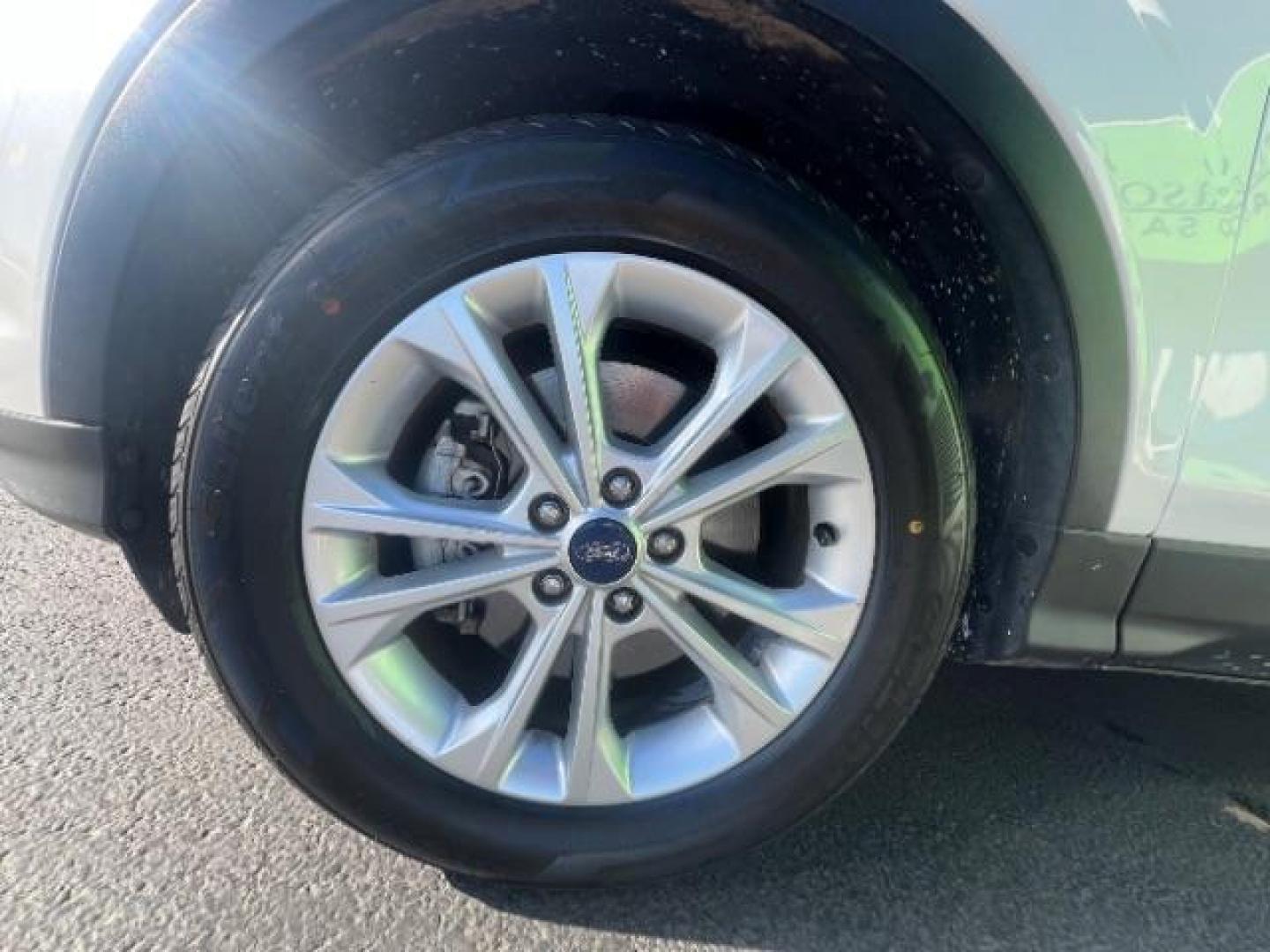 2017 Oxford White /Medium Light Stone Ford Escape SE (1FMCU0G91HU) with an EcoBoost 1.5L I-4 gasoline direct injection engine, Automatic transmission, located at 1865 East Red Hills Pkwy, St. George, 84770, (435) 628-0023, 37.120850, -113.543640 - We specialize in helping ALL people get the best financing available. No matter your credit score, good, bad or none we can get you an amazing rate. Had a bankruptcy, divorce, or repossessions? We give you the green light to get your credit back on the road. Low down and affordable payments that fit - Photo#11