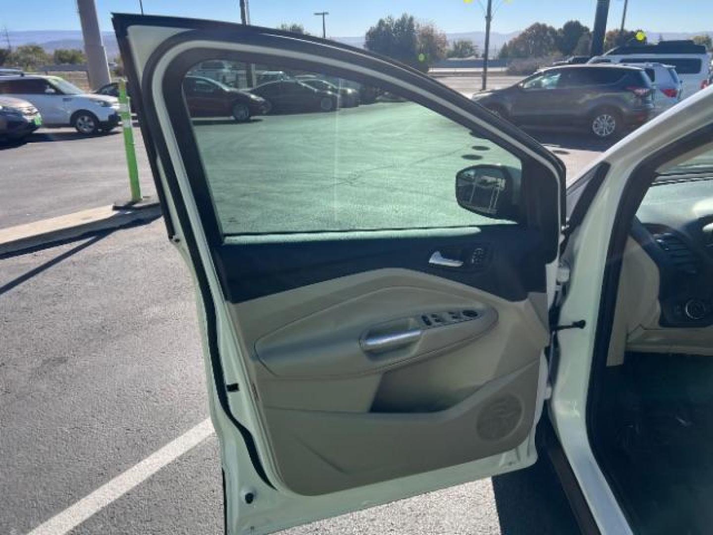 2017 Oxford White /Medium Light Stone Ford Escape SE (1FMCU0G91HU) with an EcoBoost 1.5L I-4 gasoline direct injection engine, Automatic transmission, located at 1865 East Red Hills Pkwy, St. George, 84770, (435) 628-0023, 37.120850, -113.543640 - We specialize in helping ALL people get the best financing available. No matter your credit score, good, bad or none we can get you an amazing rate. Had a bankruptcy, divorce, or repossessions? We give you the green light to get your credit back on the road. Low down and affordable payments that fit - Photo#12