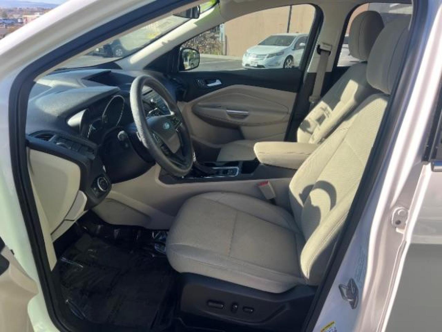 2017 Oxford White /Medium Light Stone Ford Escape SE (1FMCU0G91HU) with an EcoBoost 1.5L I-4 gasoline direct injection engine, Automatic transmission, located at 1865 East Red Hills Pkwy, St. George, 84770, (435) 628-0023, 37.120850, -113.543640 - We specialize in helping ALL people get the best financing available. No matter your credit score, good, bad or none we can get you an amazing rate. Had a bankruptcy, divorce, or repossessions? We give you the green light to get your credit back on the road. Low down and affordable payments that fit - Photo#14
