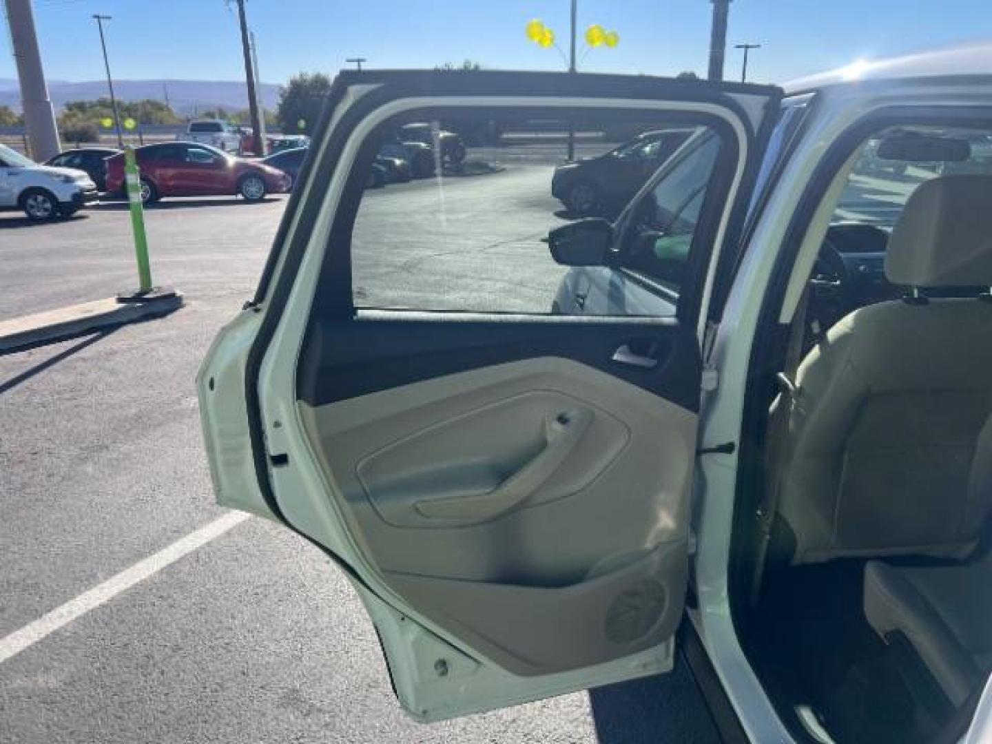 2017 Oxford White /Medium Light Stone Ford Escape SE (1FMCU0G91HU) with an EcoBoost 1.5L I-4 gasoline direct injection engine, Automatic transmission, located at 1865 East Red Hills Pkwy, St. George, 84770, (435) 628-0023, 37.120850, -113.543640 - We specialize in helping ALL people get the best financing available. No matter your credit score, good, bad or none we can get you an amazing rate. Had a bankruptcy, divorce, or repossessions? We give you the green light to get your credit back on the road. Low down and affordable payments that fit - Photo#20