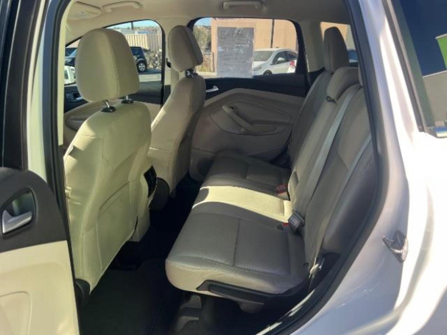 2017 Oxford White /Medium Light Stone Ford Escape SE (1FMCU0G91HU) with an EcoBoost 1.5L I-4 gasoline direct injection engine, Automatic transmission, located at 1865 East Red Hills Pkwy, St. George, 84770, (435) 628-0023, 37.120850, -113.543640 - We specialize in helping ALL people get the best financing available. No matter your credit score, good, bad or none we can get you an amazing rate. Had a bankruptcy, divorce, or repossessions? We give you the green light to get your credit back on the road. Low down and affordable payments that fit - Photo#21