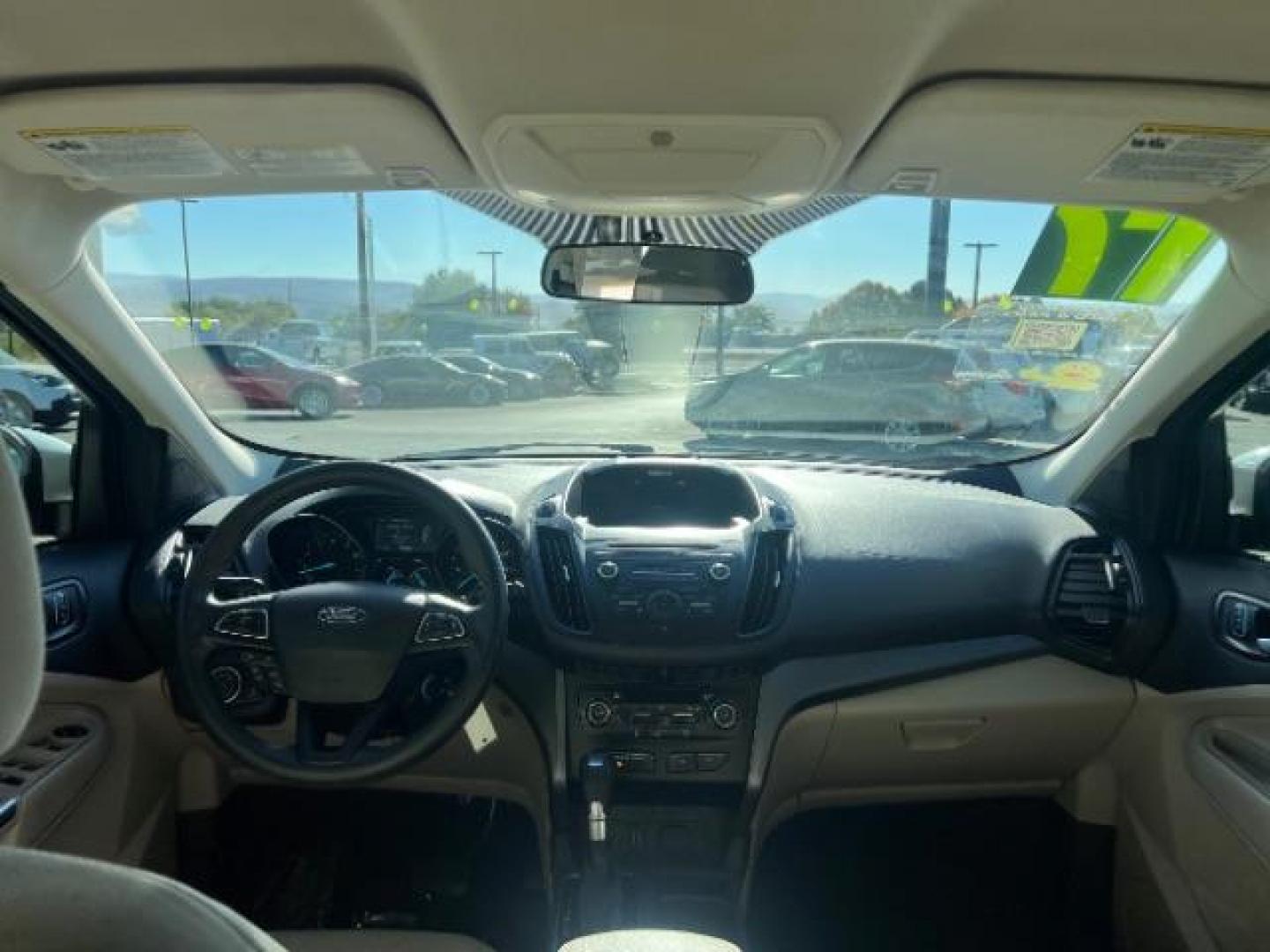 2017 Oxford White /Medium Light Stone Ford Escape SE (1FMCU0G91HU) with an EcoBoost 1.5L I-4 gasoline direct injection engine, Automatic transmission, located at 1865 East Red Hills Pkwy, St. George, 84770, (435) 628-0023, 37.120850, -113.543640 - We specialize in helping ALL people get the best financing available. No matter your credit score, good, bad or none we can get you an amazing rate. Had a bankruptcy, divorce, or repossessions? We give you the green light to get your credit back on the road. Low down and affordable payments that fit - Photo#23
