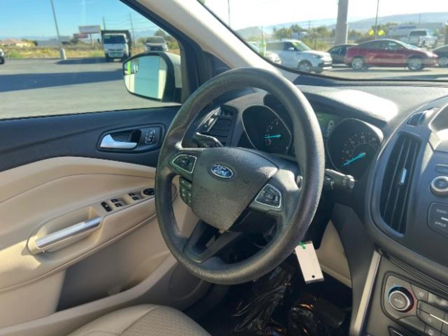 2017 Oxford White /Medium Light Stone Ford Escape SE (1FMCU0G91HU) with an EcoBoost 1.5L I-4 gasoline direct injection engine, Automatic transmission, located at 1865 East Red Hills Pkwy, St. George, 84770, (435) 628-0023, 37.120850, -113.543640 - We specialize in helping ALL people get the best financing available. No matter your credit score, good, bad or none we can get you an amazing rate. Had a bankruptcy, divorce, or repossessions? We give you the green light to get your credit back on the road. Low down and affordable payments that fit - Photo#31