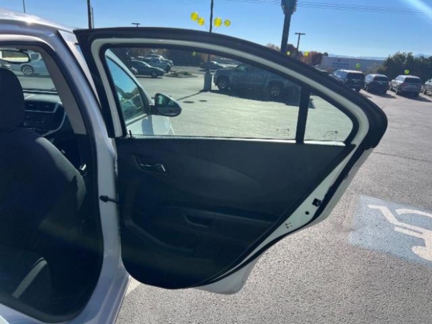 2017 Summit White /Jet Black/Dark Titanium Chevrolet Sonic LT Auto (1G1JD5SHXH4) with an ECOTEC 1.8L I-4 DOHC engine, Automatic transmission, located at 1865 East Red Hills Pkwy, St. George, 84770, (435) 628-0023, 37.120850, -113.543640 - We specialize in helping ALL people get the best financing available. No matter your credit score, good, bad or none we can get you an amazing rate. Had a bankruptcy, divorce, or repossessions? We give you the green light to get your credit back on the road. Low down and affordable payments that fit - Photo#23