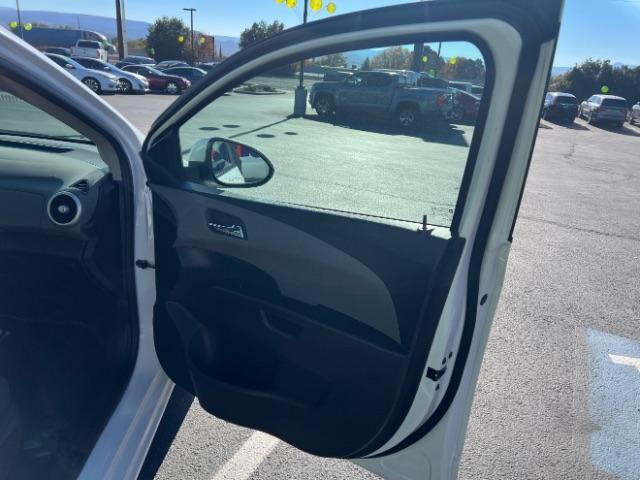 2017 Summit White /Jet Black/Dark Titanium Chevrolet Sonic LT Auto (1G1JD5SHXH4) with an ECOTEC 1.8L I-4 DOHC engine, Automatic transmission, located at 1865 East Red Hills Pkwy, St. George, 84770, (435) 628-0023, 37.120850, -113.543640 - We specialize in helping ALL people get the best financing available. No matter your credit score, good, bad or none we can get you an amazing rate. Had a bankruptcy, divorce, or repossessions? We give you the green light to get your credit back on the road. Low down and affordable payments that fit - Photo#25